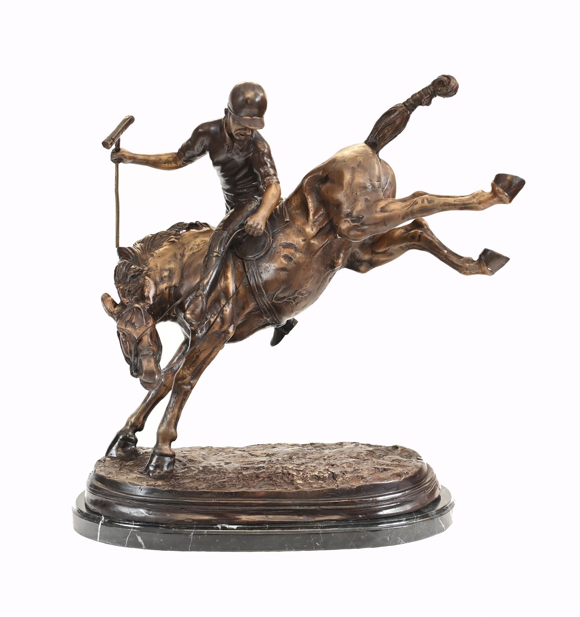 Stunning English Bronze statue showing polo player on a bucking bronze
Stands in at over two feet tall so an impressive work
The patina to the bronze is superb and this is ready to display
No signs of damage or other defects
The artist has really