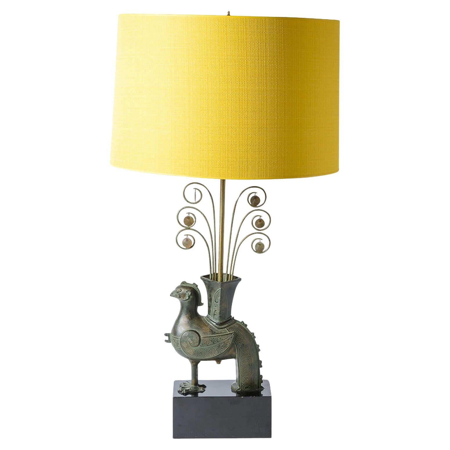 Just in,  this Cast Metal Pompeian Bronze Bird Table Lamp, C.1950s
Made of Bronze with an original untouched original  patina.
This Bronze lamp is quite rare.
This lamp is all original and still has all of  the 6 small metal Shells hanging from each