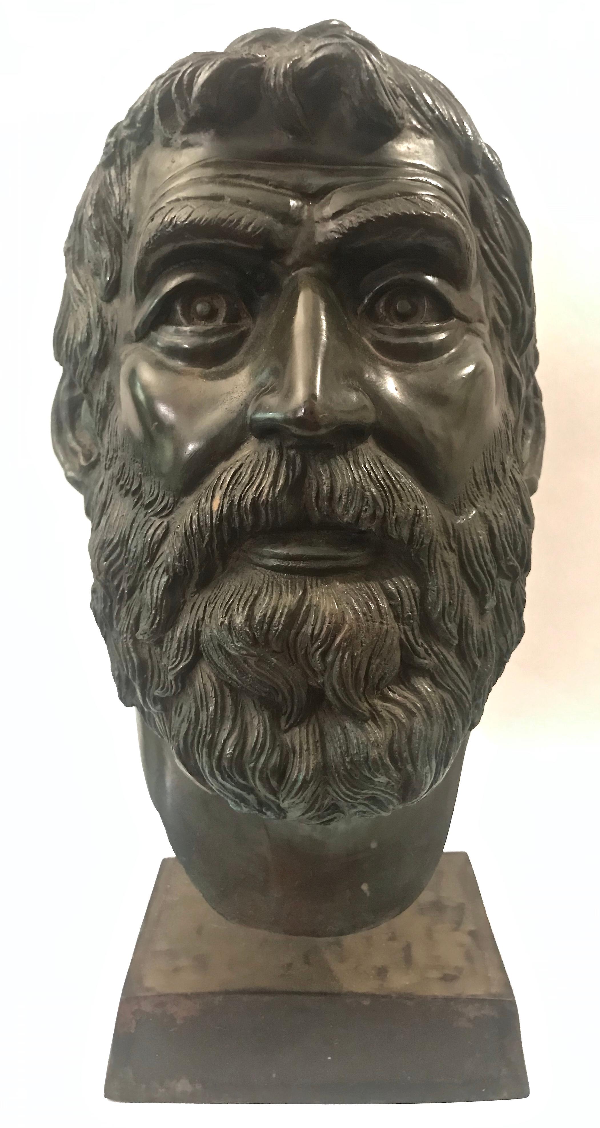 Bronze portrait bust of a bearded man with later custom metal base, 19th century.