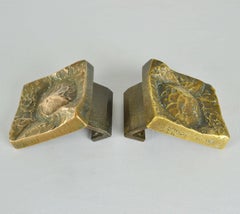 Architectural Pairs of Bronze Push and Pull Door Handles with Art Relief