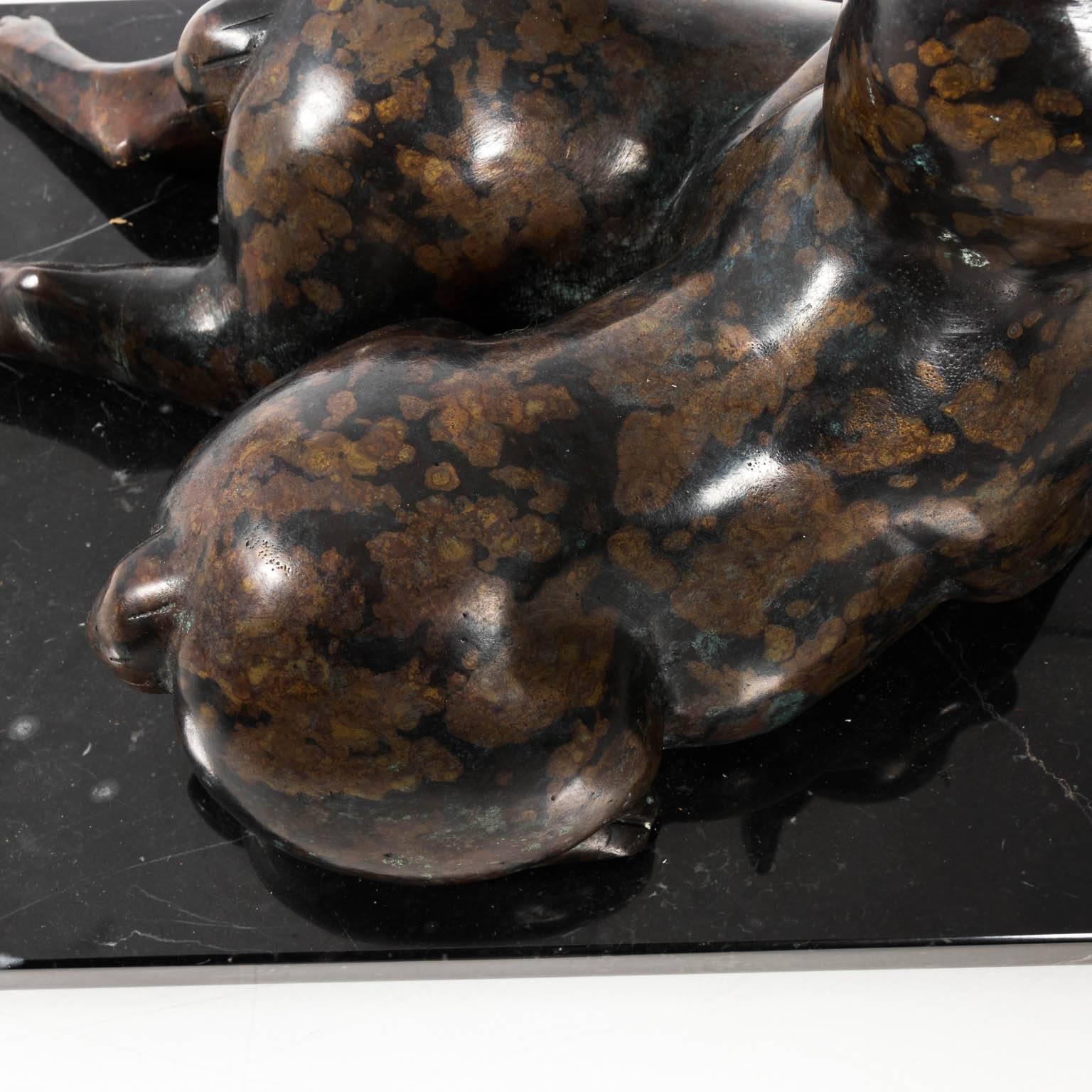 Bronze rabbit sculpture on a black marble base in a polished finish, circa late 20th century.
 