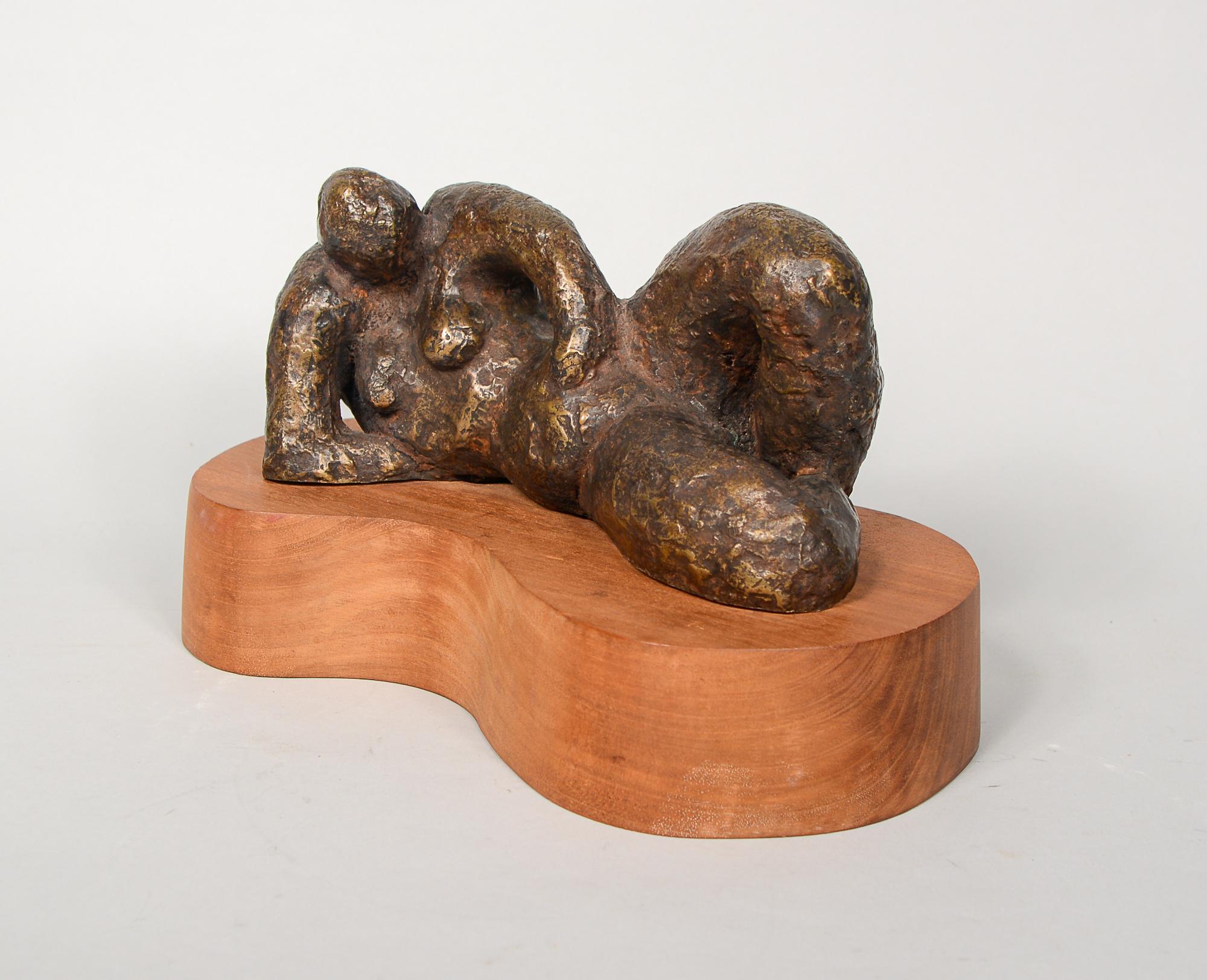Bronze figurative sculpture by Jean (Bloomfield) Byington. Jean is the daughter of the sculptor Elinore Gallas Bloomfield. This sculpture was likely done while she studied fine art at the University of California, Santa Cruz.
