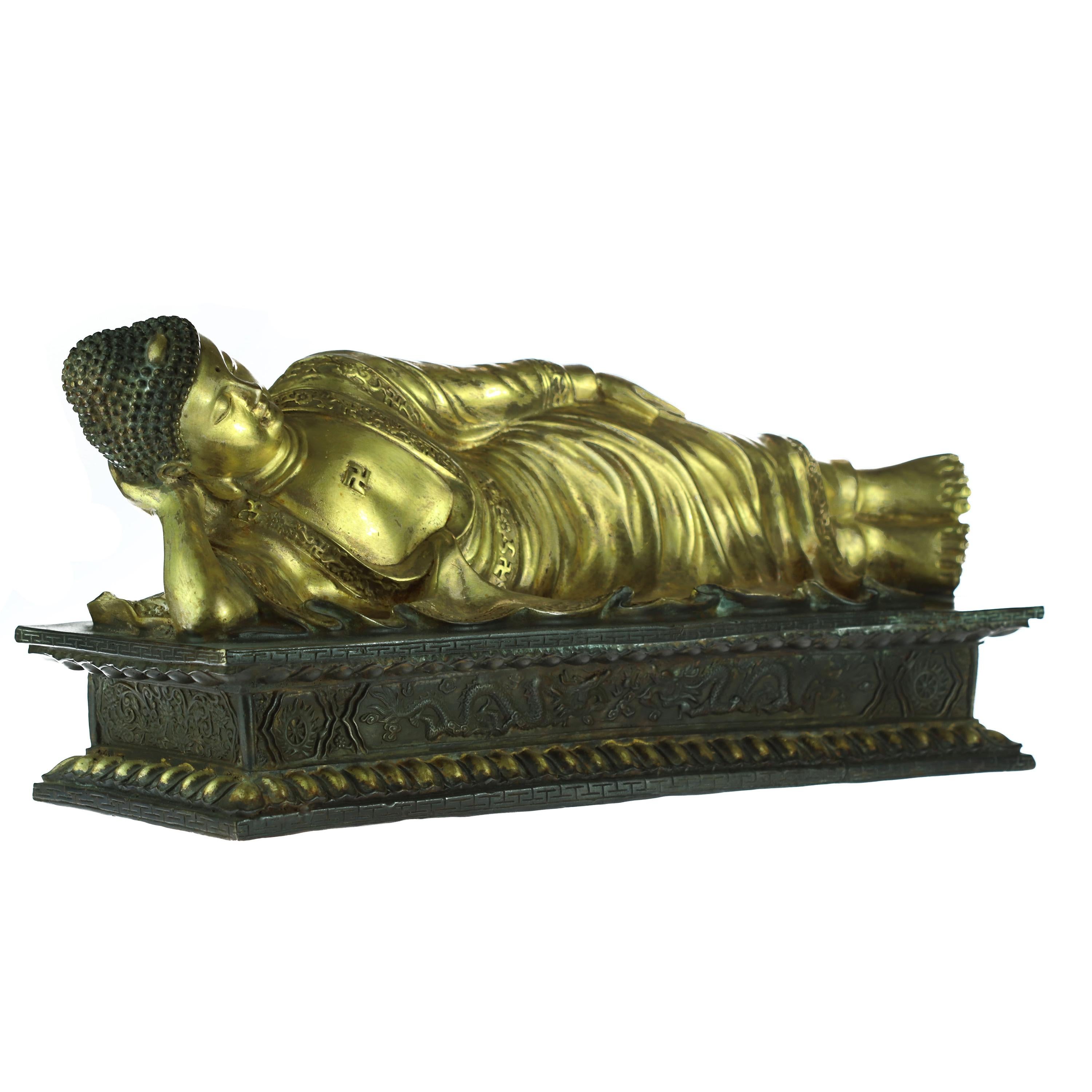 Breathtaking sculpture full of love and meaning. Hand carved bronze reclining Buddha that represents Buddha lying down and is a major iconographic and statuary pattern of Buddhism. It represents the historical Buddha during his last illness, about