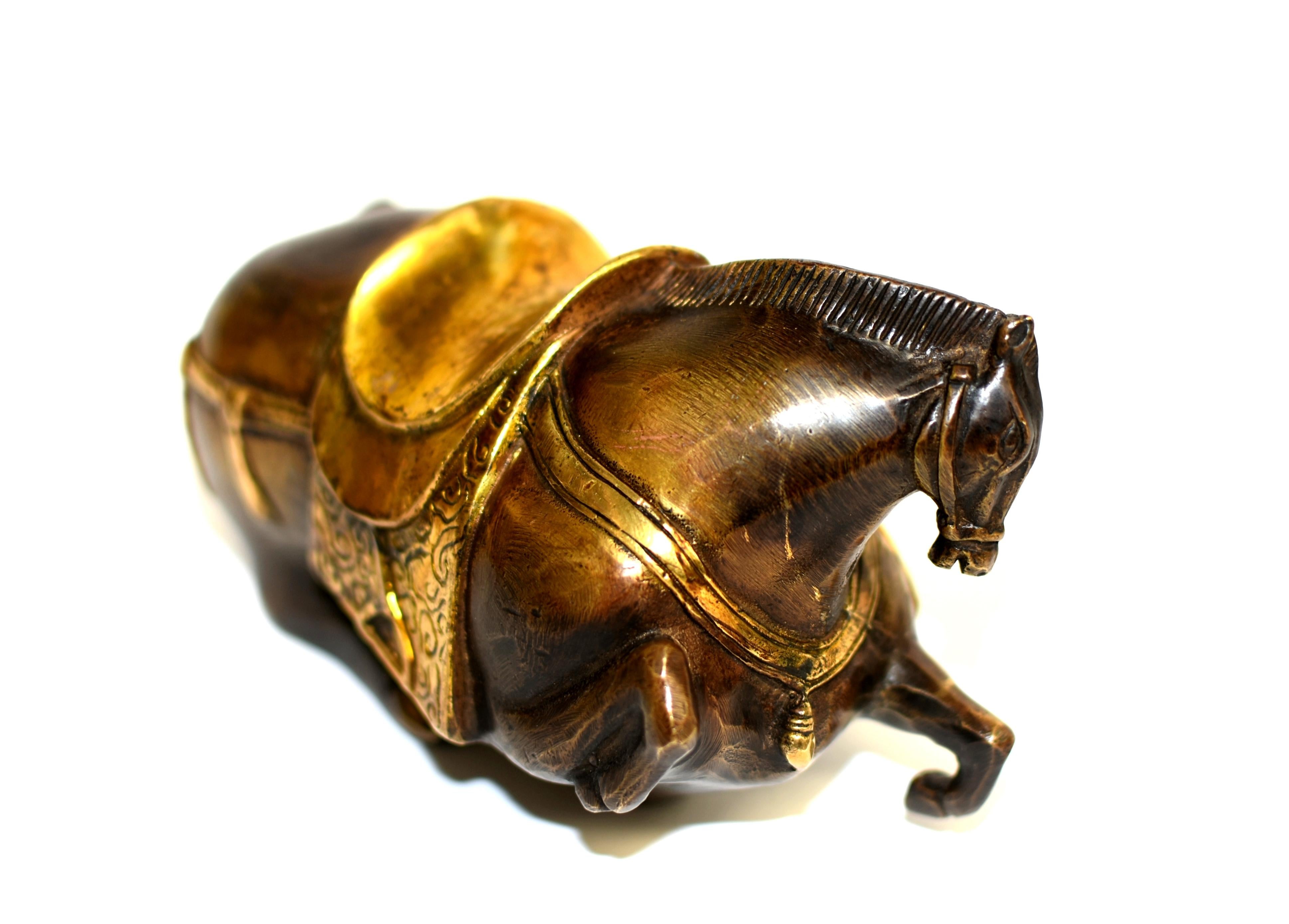 20th Century Bronze Recumbent Horse Han Style with Gilded Saddle For Sale