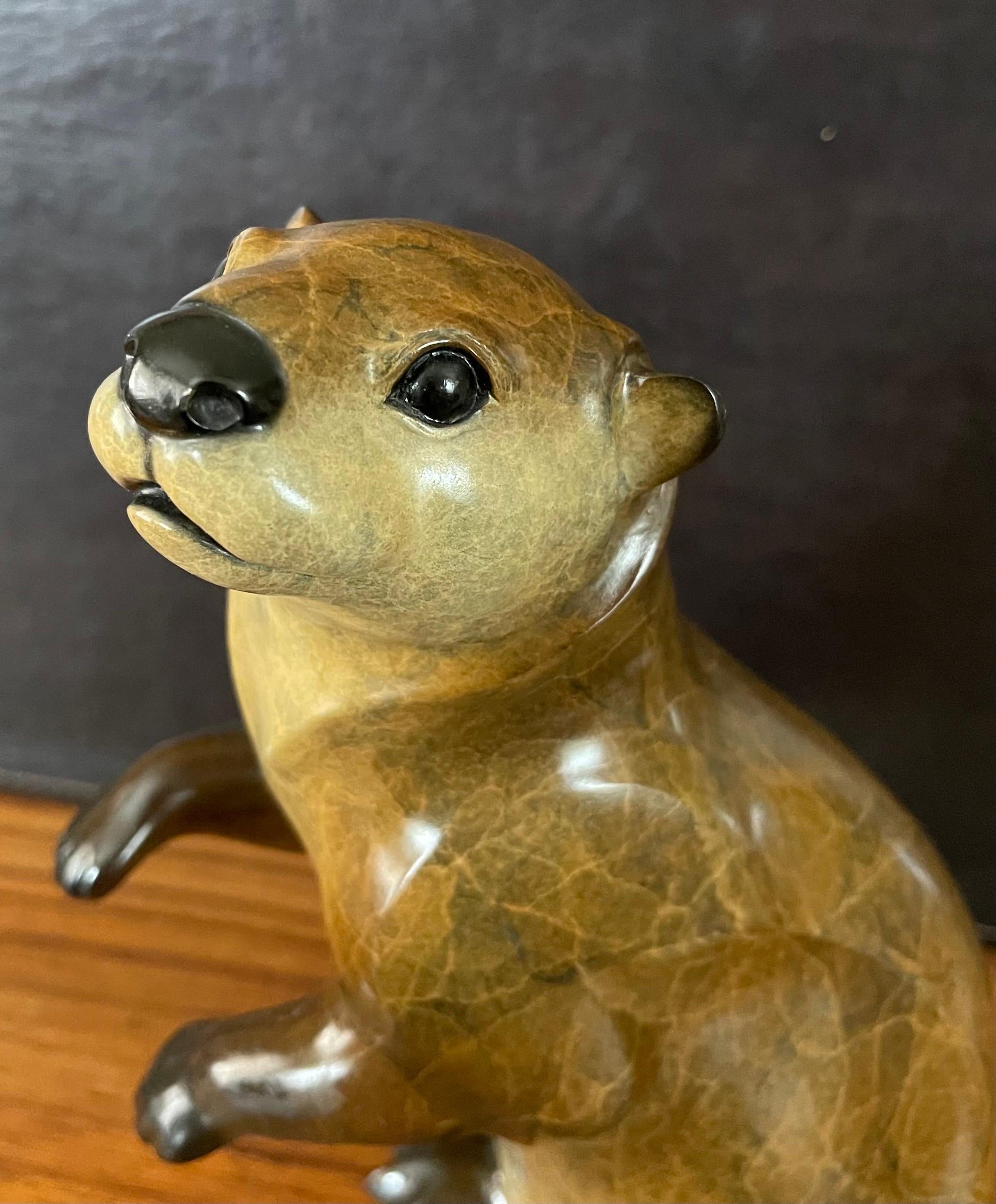 Bronze River Otter Sculpture Entitled 