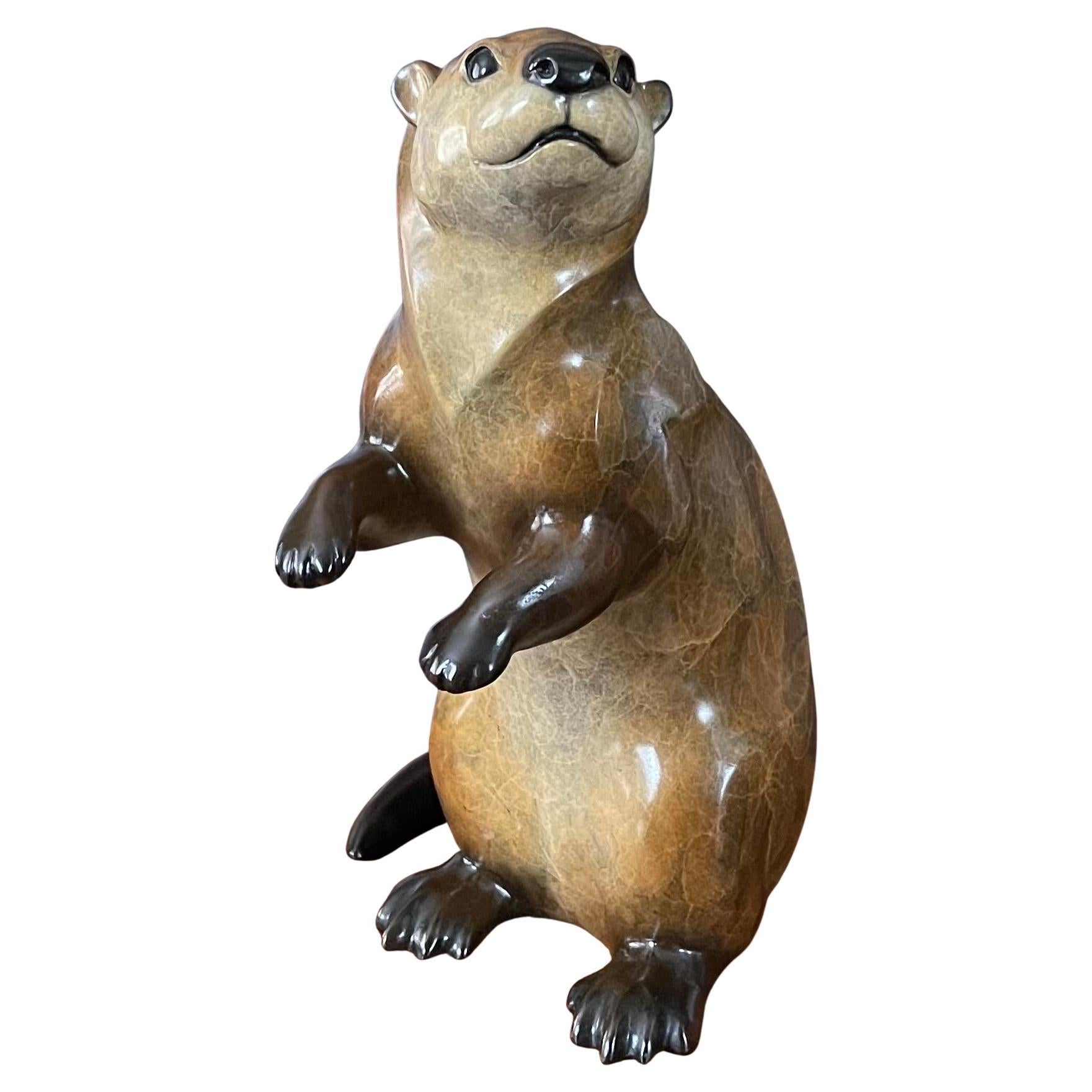 Bronze River Otter Sculpture Entitled 
