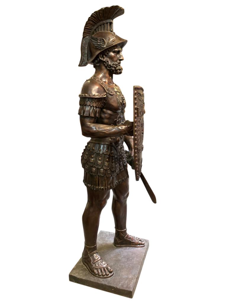 Absolutely stunning bronze Roman gladiator, 20th century, measuring over seven feet tall. Immense and absolutely stunning and more impressive in flesh. Patina is superb and the casting is amazing. Can live outside with no fear of rusting as bronze.