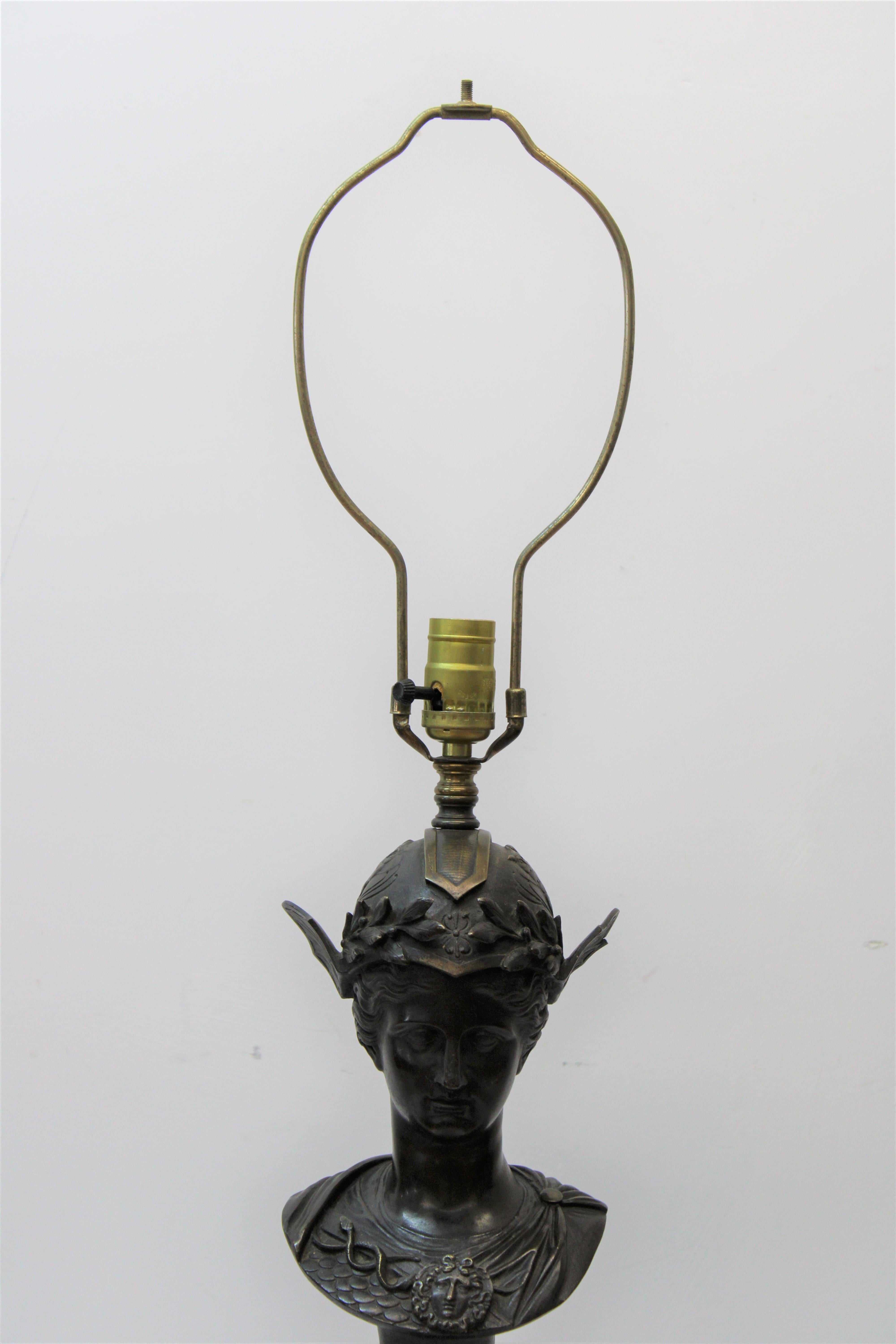 C. late 19th century - early 20th century

Bronze Roman goddess table lamp w/ marble & brass base.