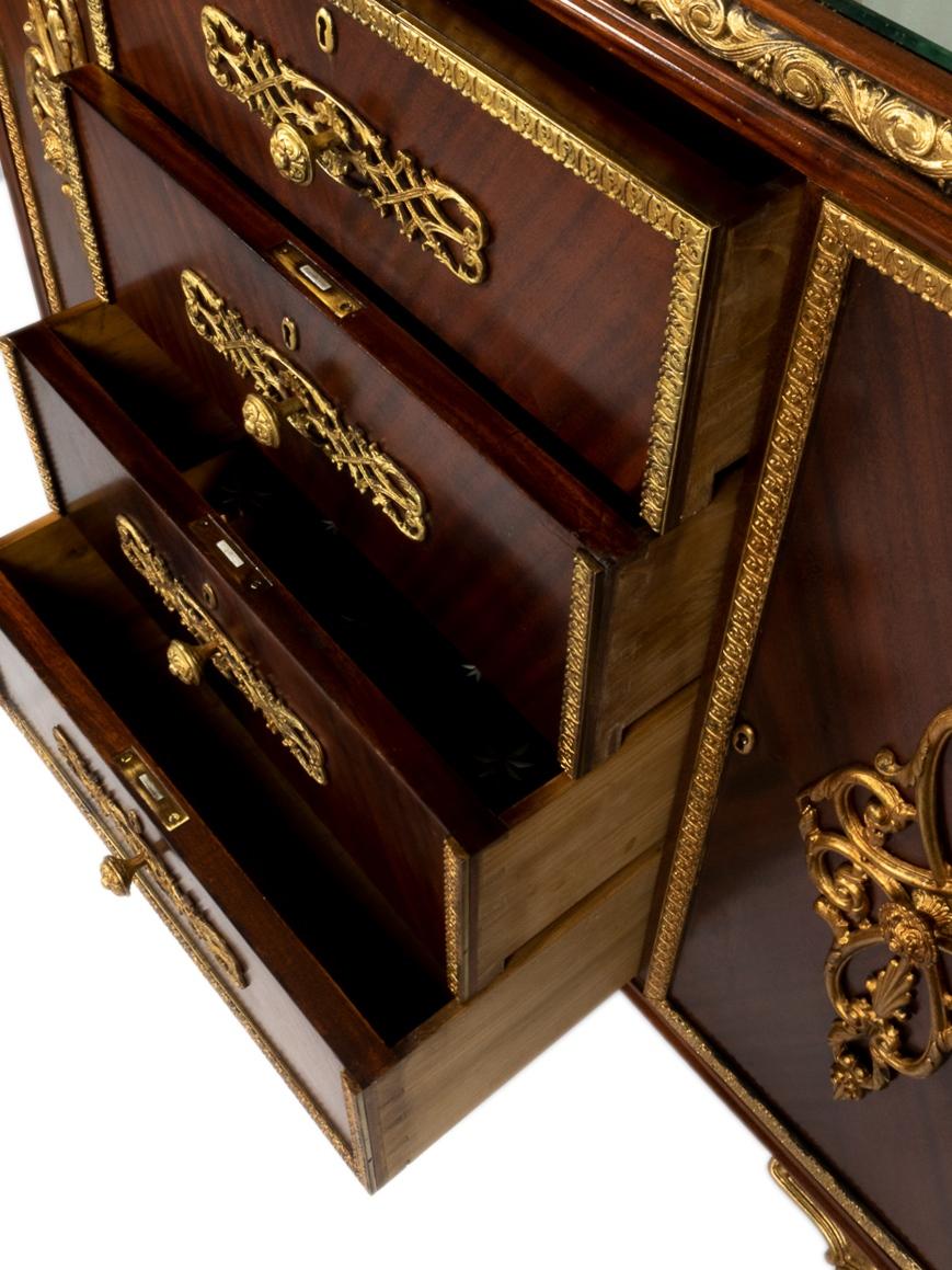 Chest of drawers with mirrored top with encrusted stars, gilded bronze and rosewood parquetry with a modern take and fusion style of Louis XV.