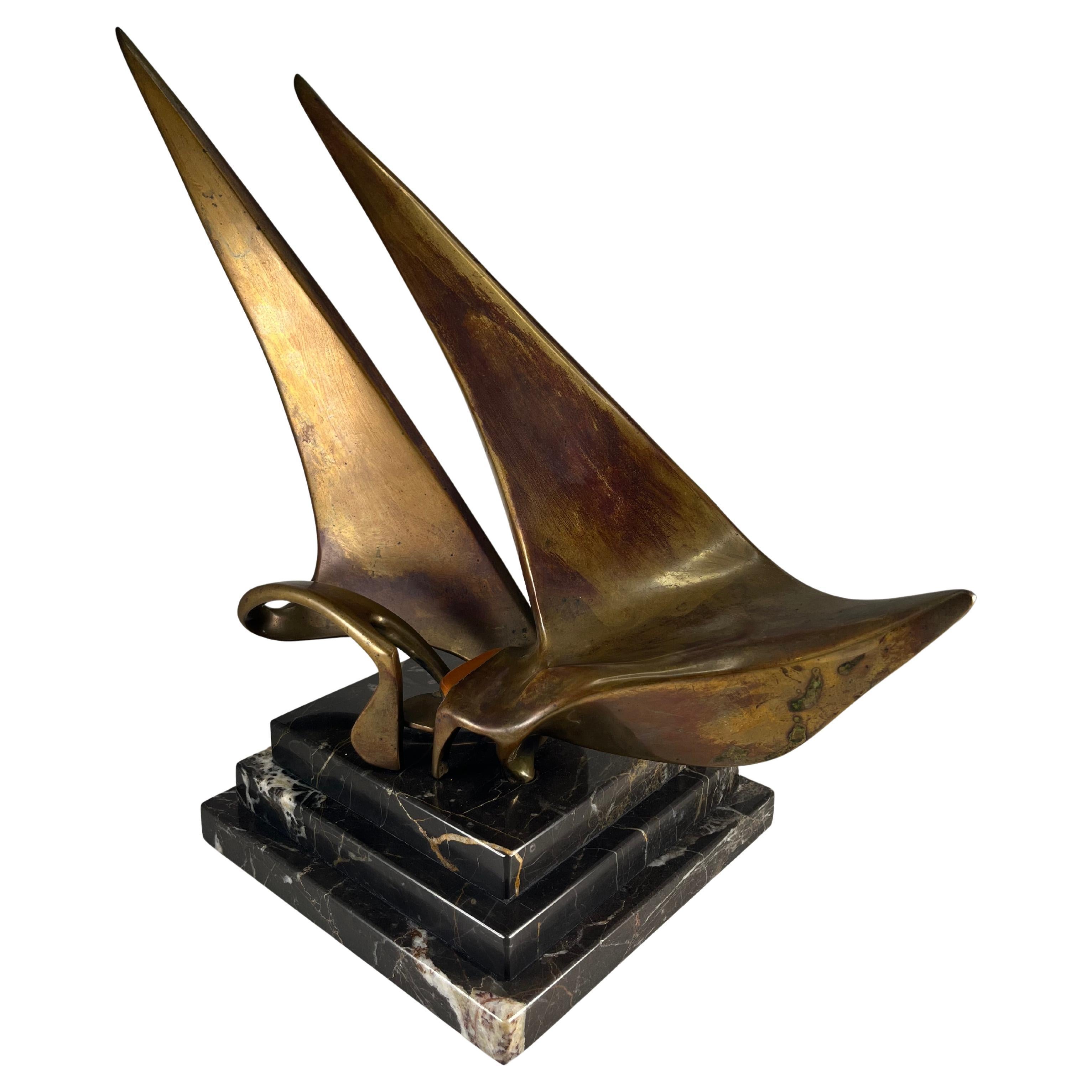 Scultura d
arte in bronzo "Barca a vela" montata su base di marmo firmata McLean 1986