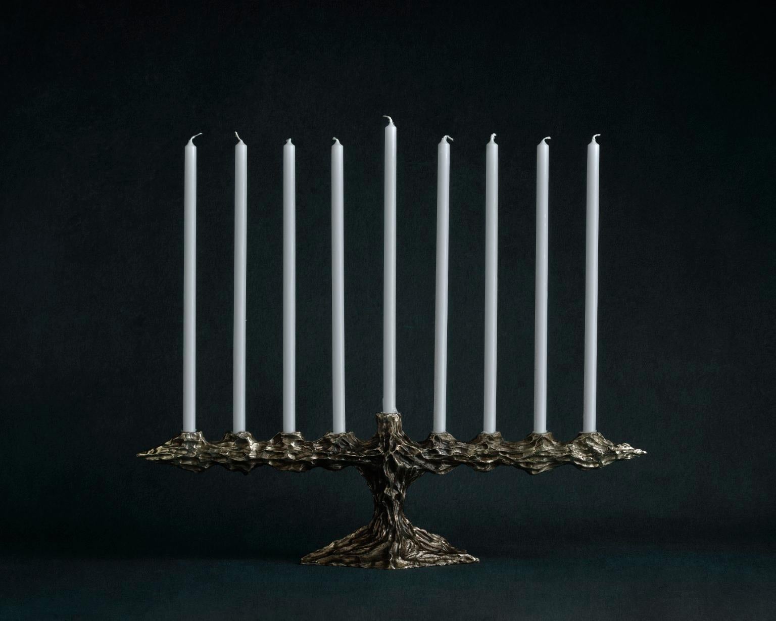 Bronze sculpted hannukah Menorah by William Guillon
Exclusively for Galerie Philia
Limited edition of 8, signed and numbered
Dimensions : W 52 x D 10 H 15 cm (42 cm with the candles) 
Materials: white silvered bronze
Hand-sculpted so each one