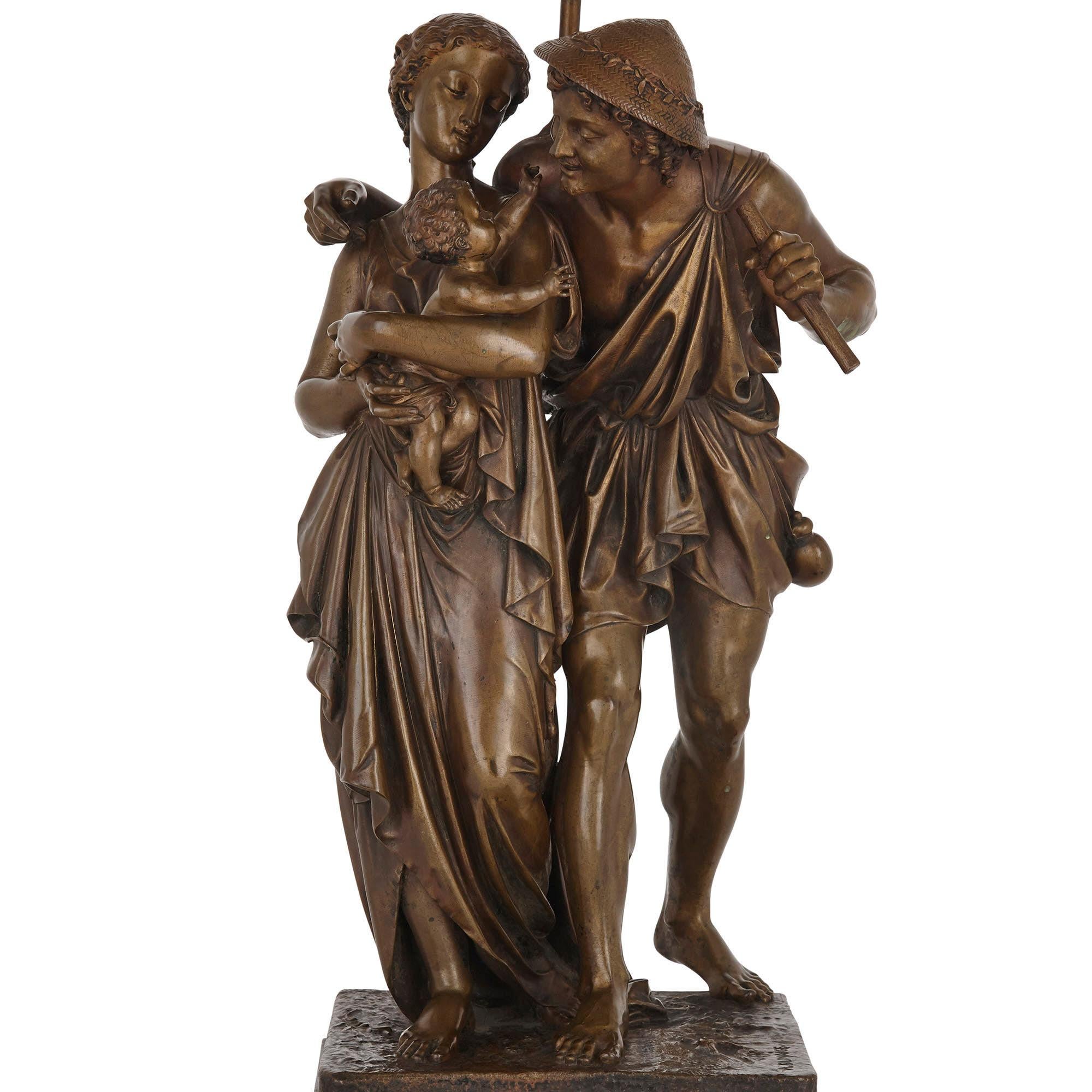 Bronze sculptural lamp by Henry Étienne Dumaige
French, 19th century
Measures: Height 69cm, width 28cm, depth 23cm

This fine figurative lamp is by Étienne Henry Dumaige, a celebrated Parisian sculptor of the 19th century. The lamp features a