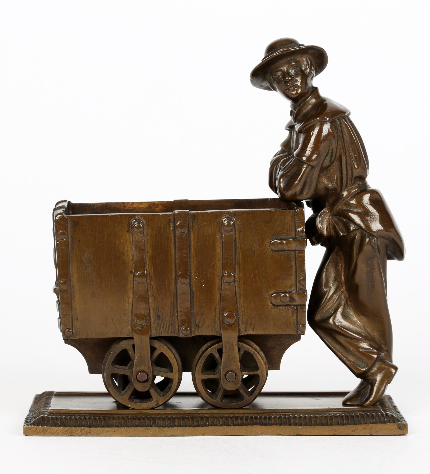 Bronze Sculptural Model of a Collier With his Coal Trolley 4