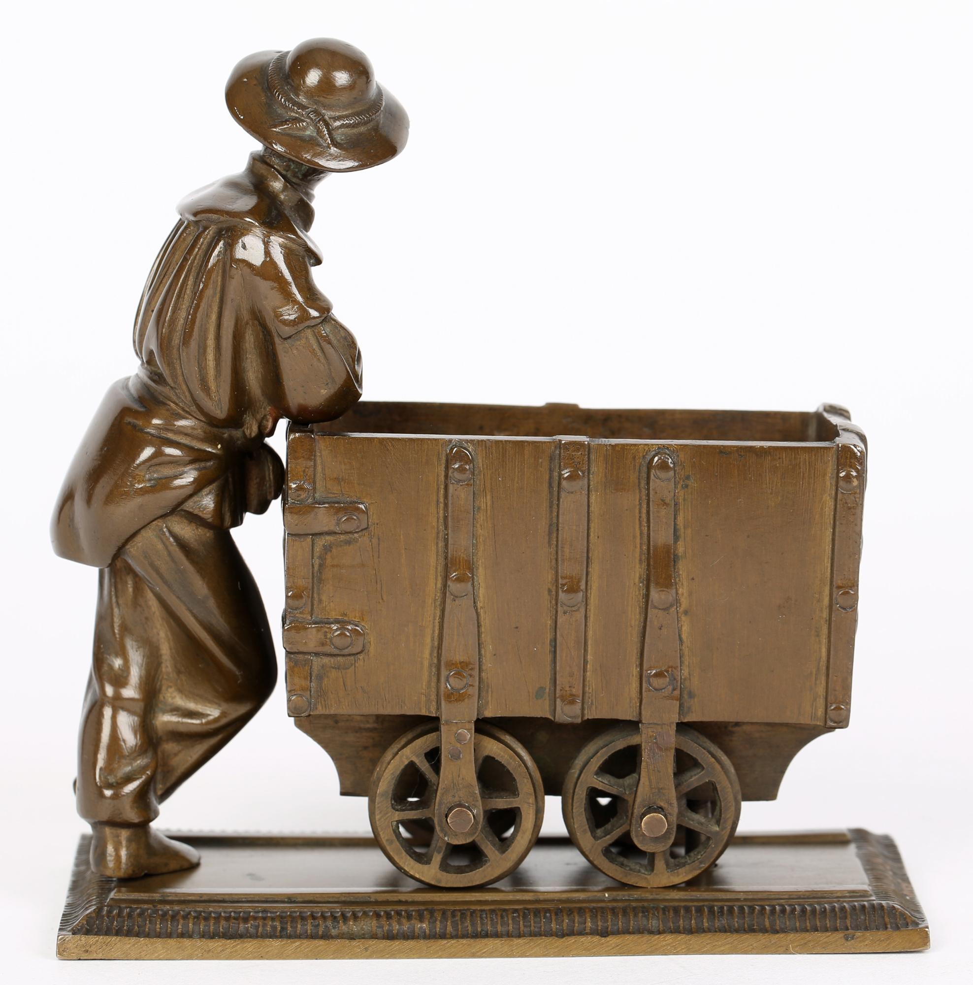 Hand-Crafted Bronze Sculptural Model of a Collier With his Coal Trolley