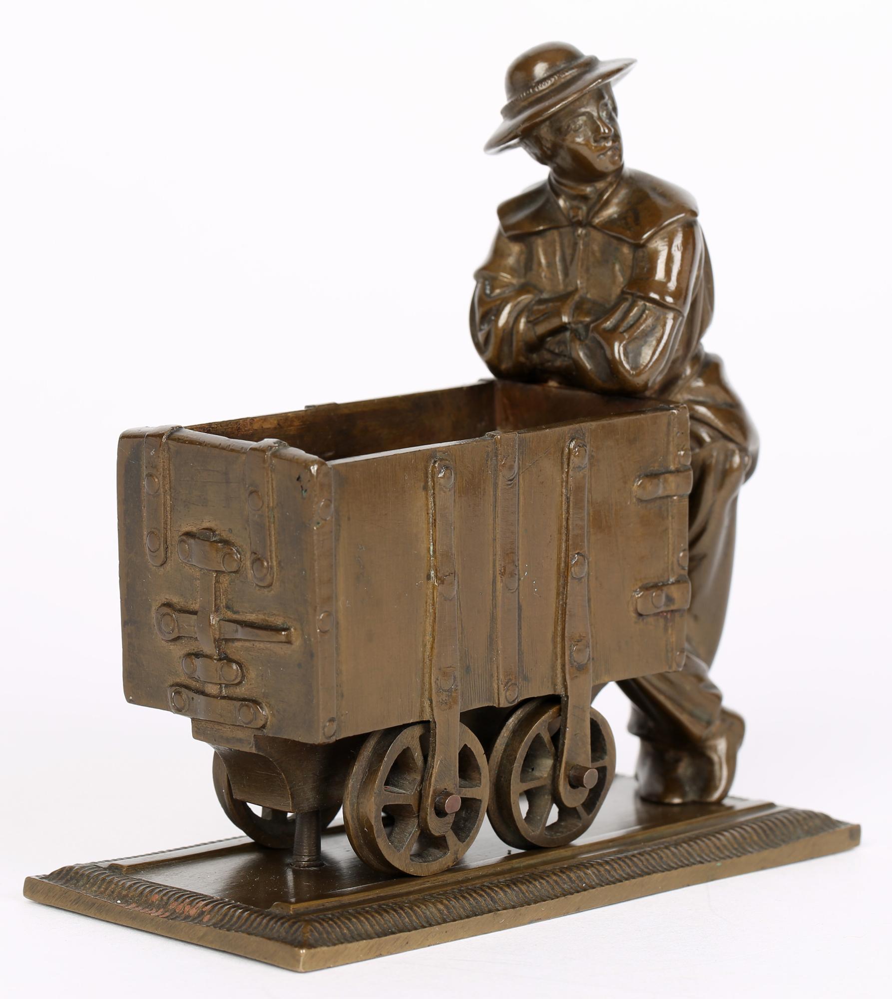 Early 20th Century Bronze Sculptural Model of a Collier With his Coal Trolley