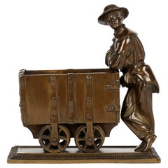 Bronze Sculptural Model of a Collier With his Coal Trolley
