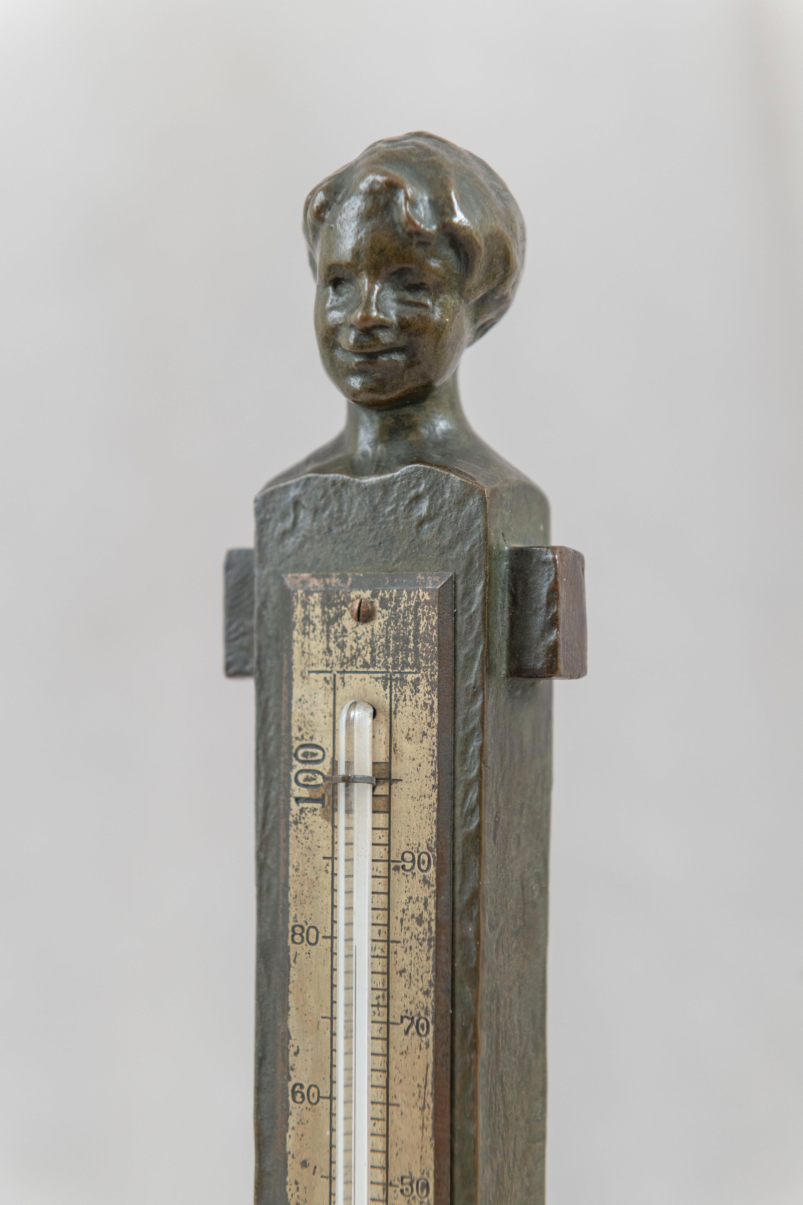 It wasn't easy trying to title this bronze in one sentence. The first thing about it to my eye is the wonderful whimsy displayed. The fact that it's a thermometer just adds to the joy of it. Showing the young girl's feet at the bottom of the