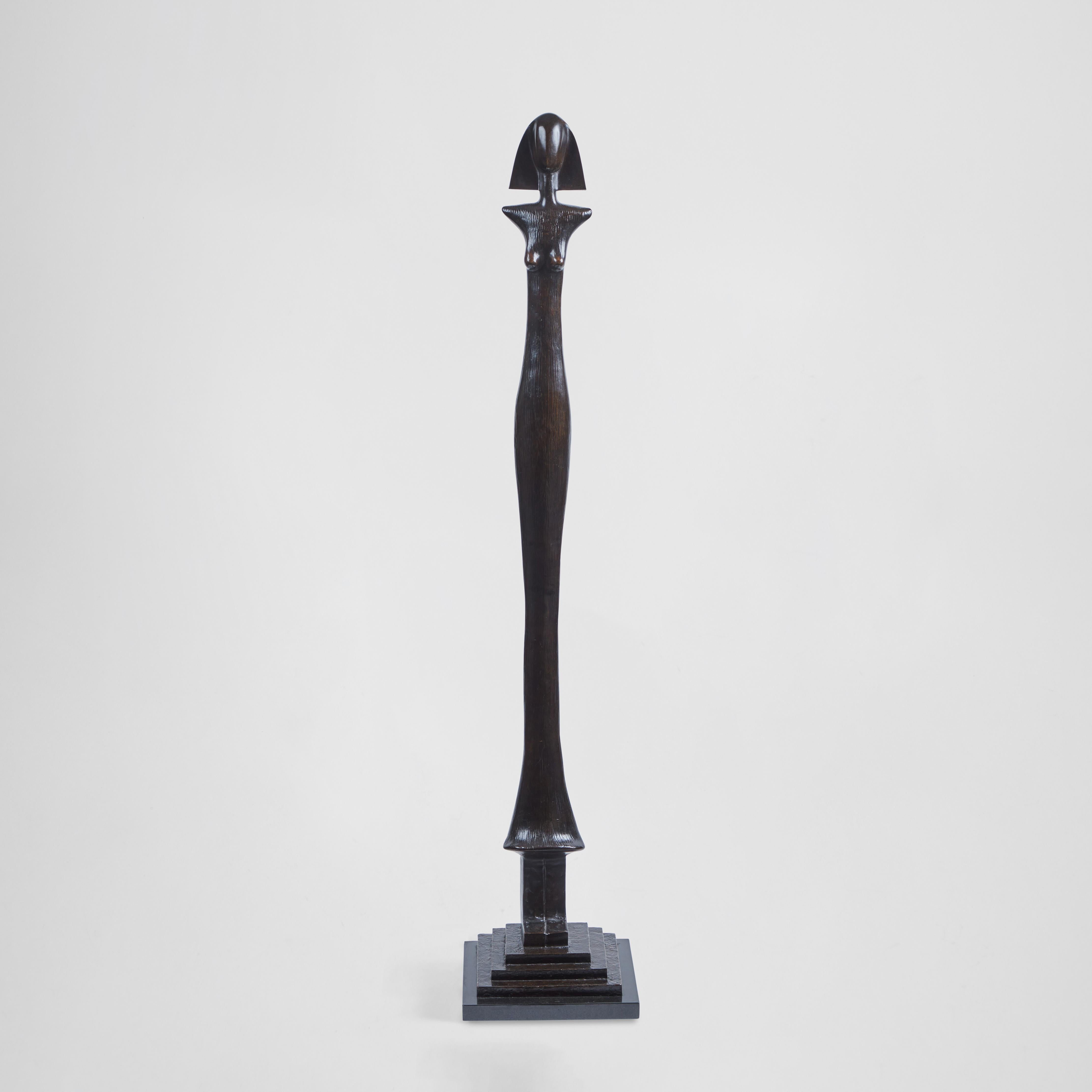 Tall, elegant Art Deco inspired bronze sculpture in the manner of Giacometti. The sculpture is stamped EXNY on the base. This sculpture was cast by the Excalibur Foundry in New York. The Excalibur Foundry retains all the original castings from the