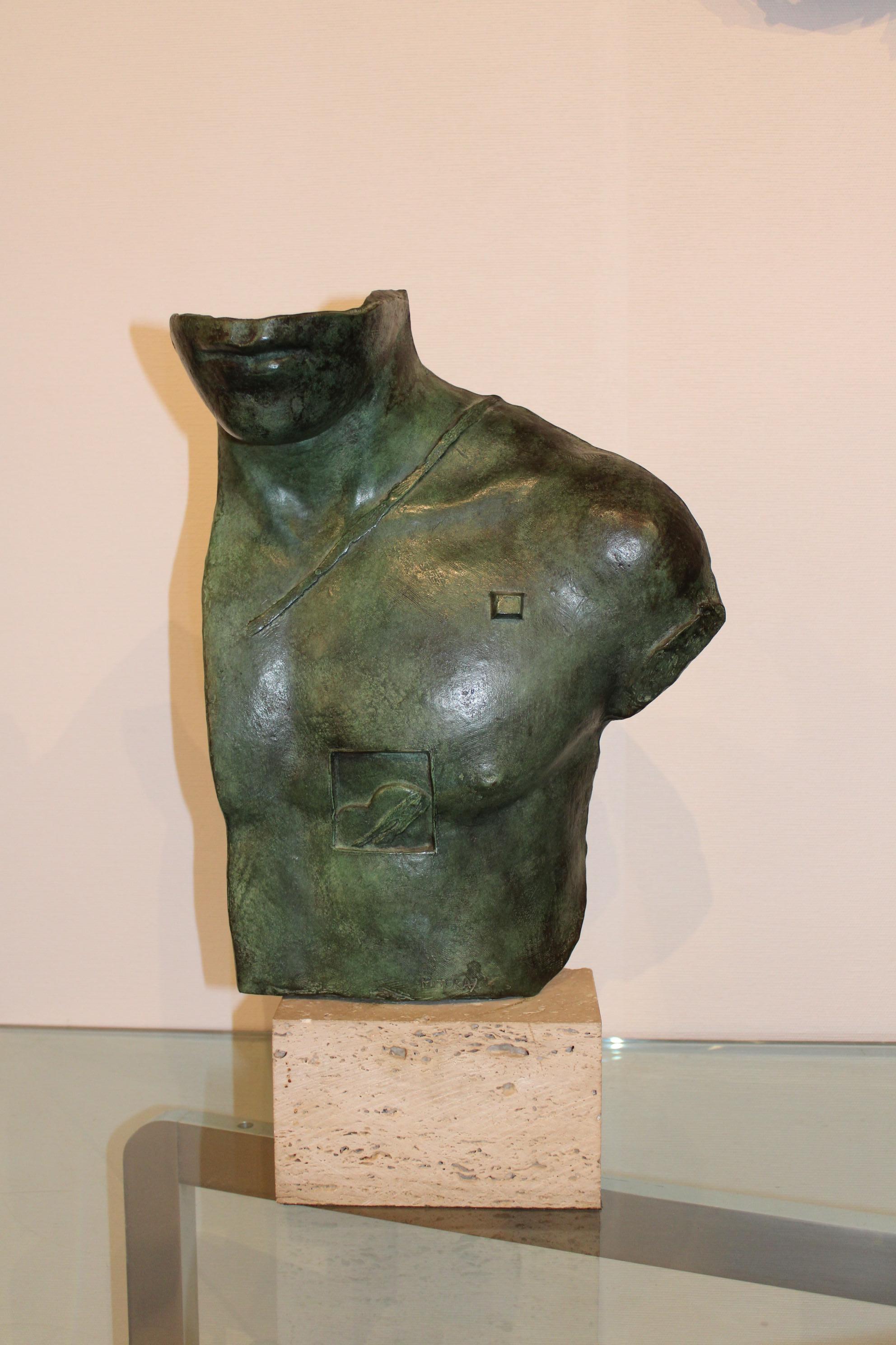 Sculpture by Igor Mitoraj (1944 - 2014)
Asclepios, from 1988
Bronze with green patina, travertine socle

Signed Mitoraj and numeroted HC. 2/1000

