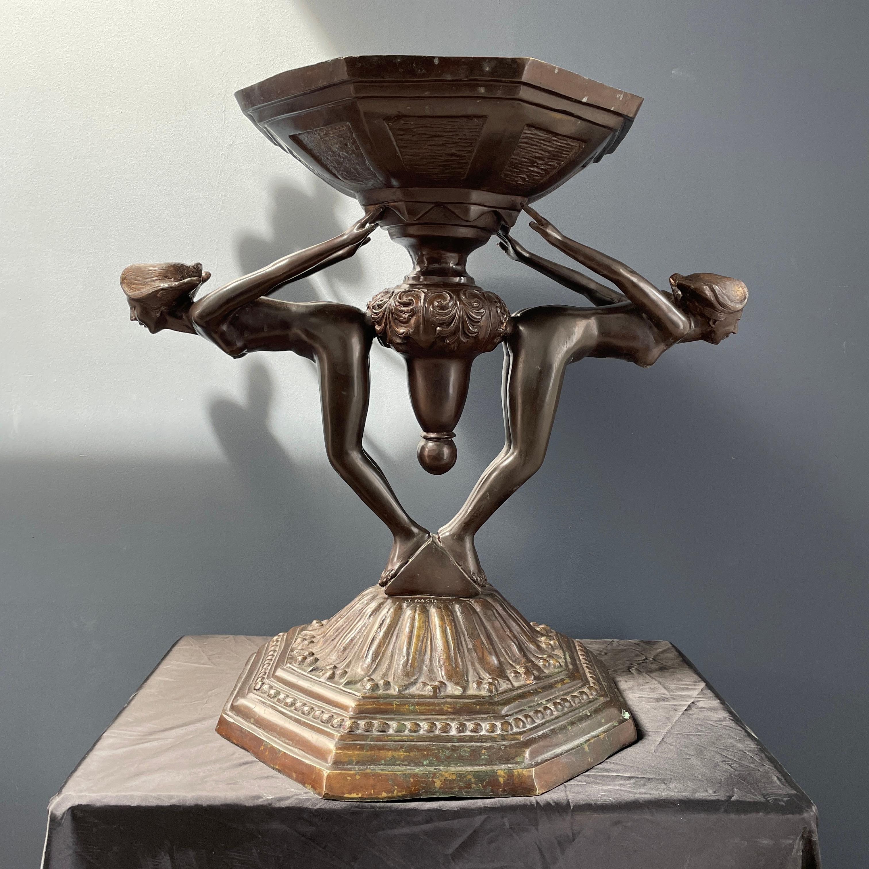 Stunning Art Deco bronze sculpture bird bath by listed artist Joseph (Guiseppe) d'Aste, c. 1920's - 30's. The heavily stylized design features 2 beautiful nudes in diving stance on a decorative base, with tiered tapered hexagonal bowl above. The