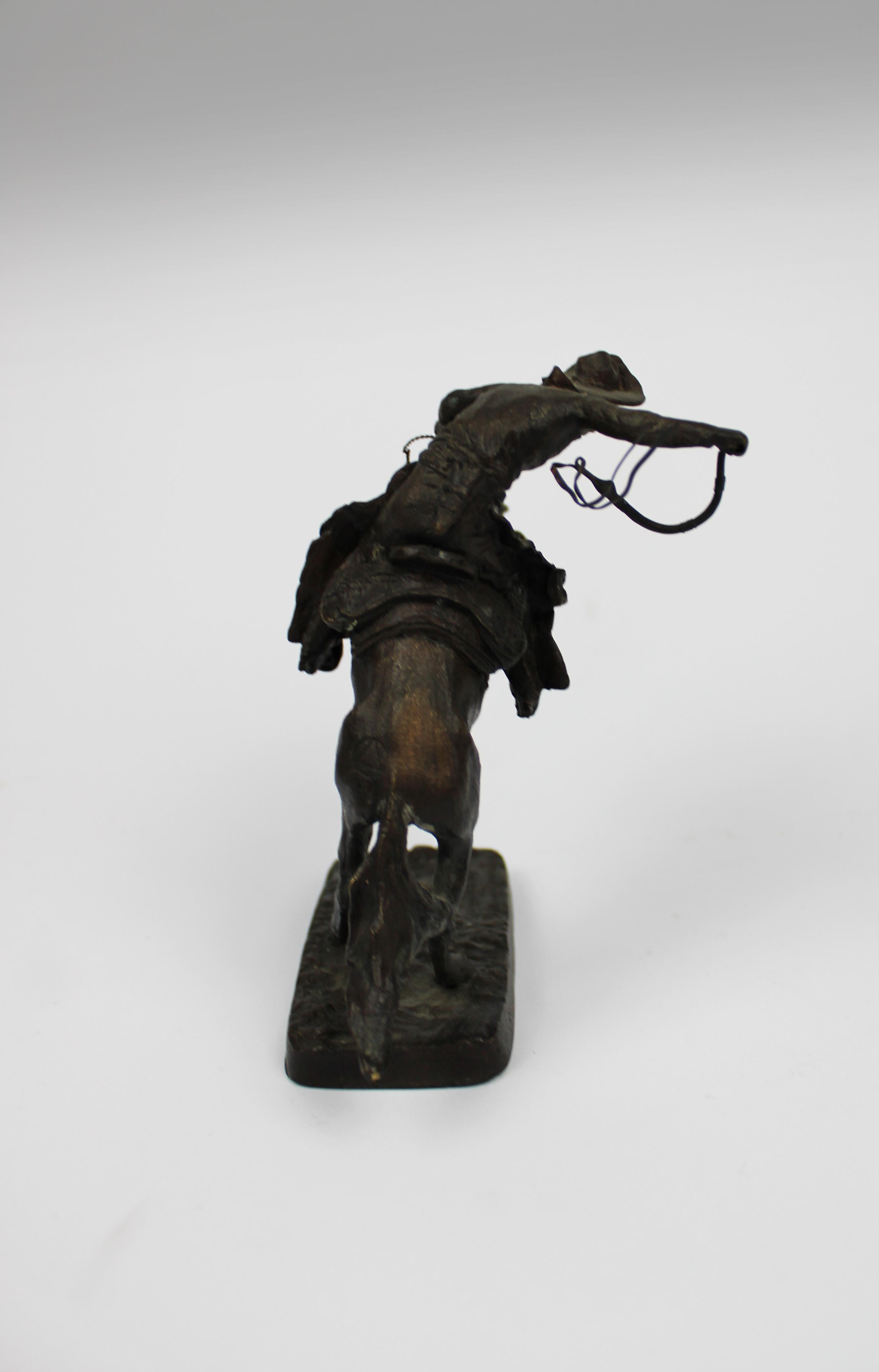 Hand-Carved Bronze Sculpture Broncho Buster Cowboy After Frederic Remington 20th Century USA For Sale