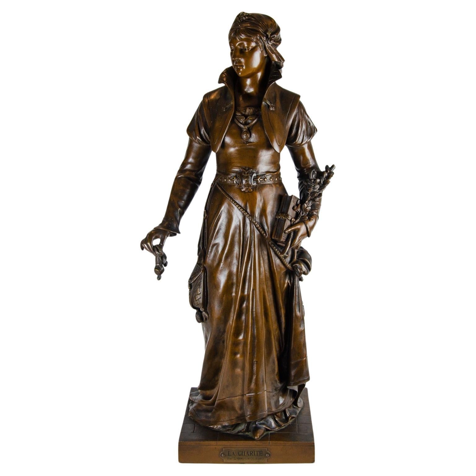 Sculpture en bronze de Louis Grégoire, XIXe siècle "La Charité"
