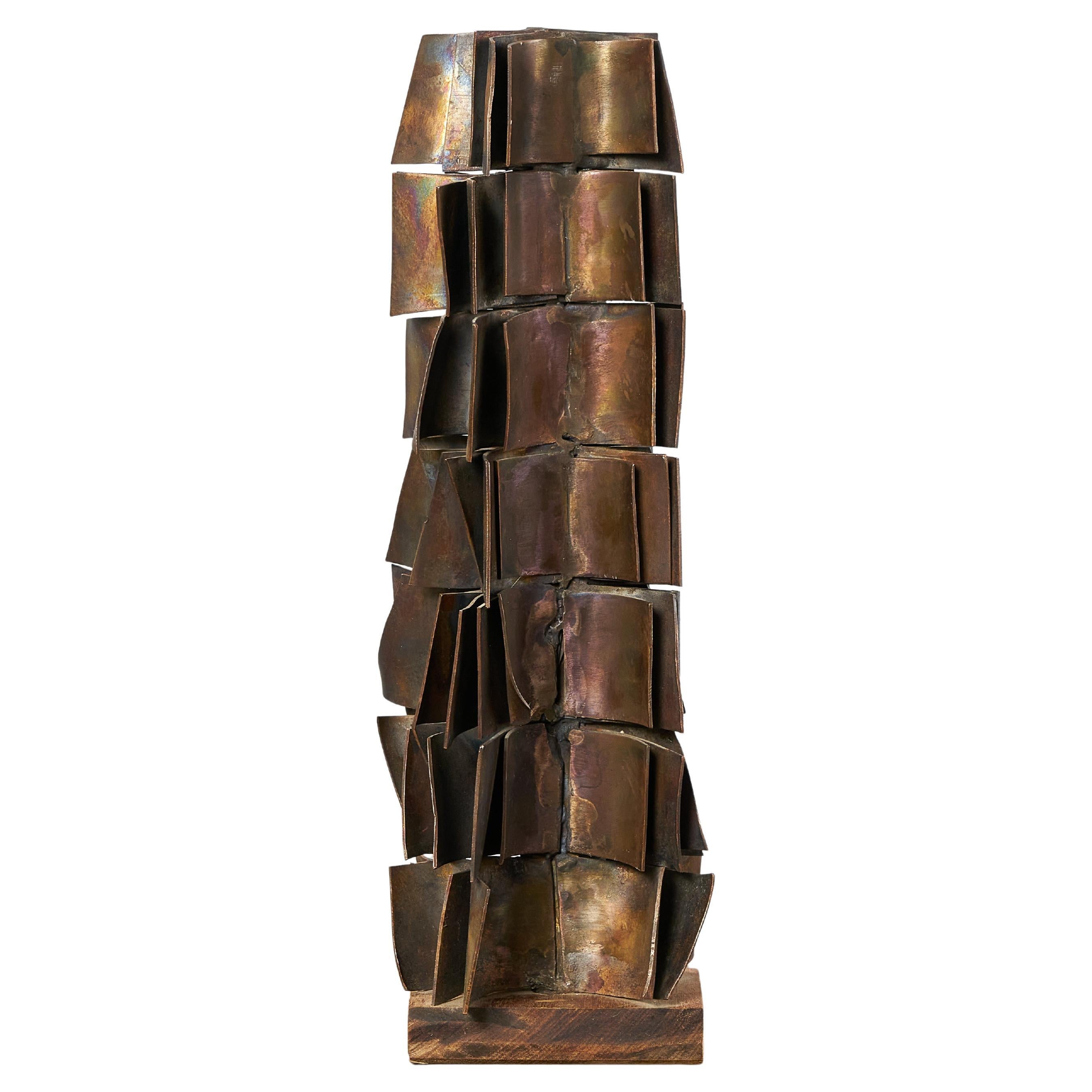 Sculpture in bronze and wood by renowned artist Duayne Hatchett (1925-2015).

