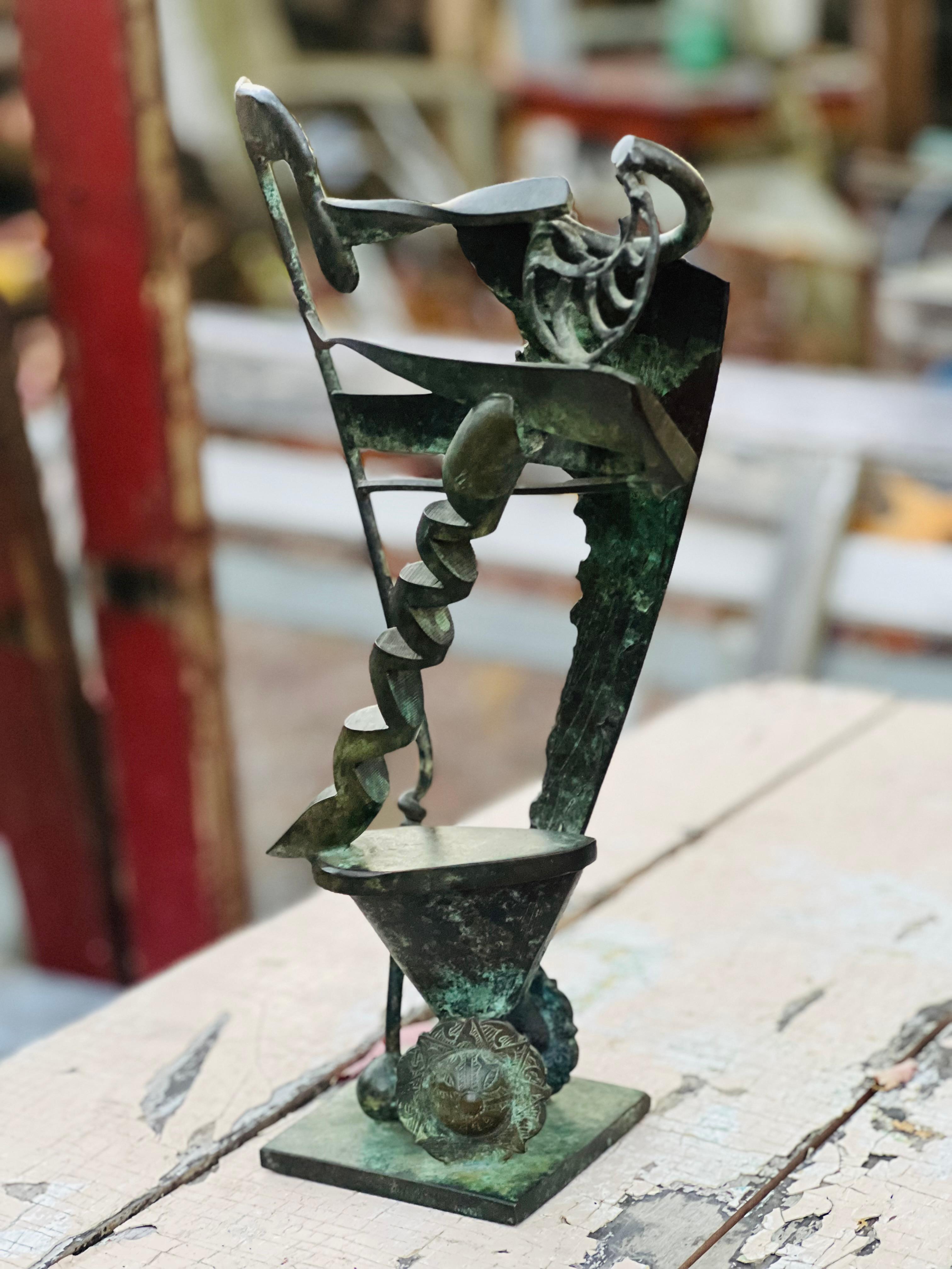 An unusual 1970s modernist sculpture in bronze by a noted American sculptor Rodger Mack (1968-2002). An abstract chariot in steampunk style...
A quick note about Rodger Mack:
