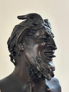 Bronzeskulptur, die die Büste eines Satyr darstellt und aus dem 19. Jahrhundert stammt (ca.).