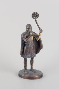 Bronze sculpture, horn blower, Danish Viking age. Denmark. Mid-20th century.
