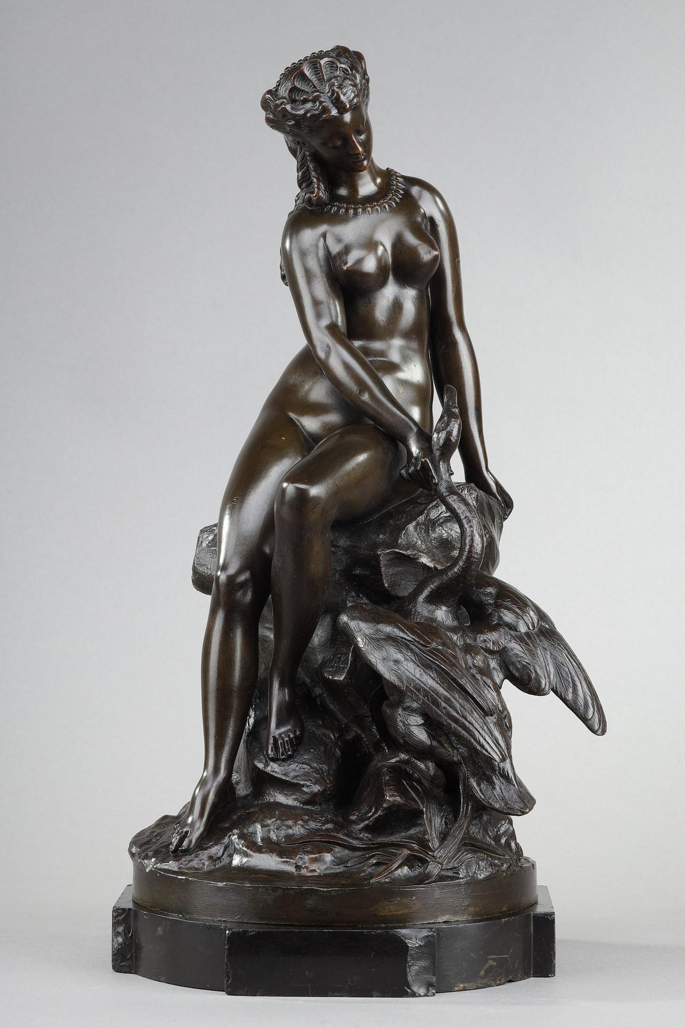Proof in bronze with shaded brown patina depicting Leda and the Swan. A great classic in the 19th century, based on the myth of Leda seduced by Zeus, who took the form of a Swan. Early edition cast signed on the mound. Black marble base.

Born in