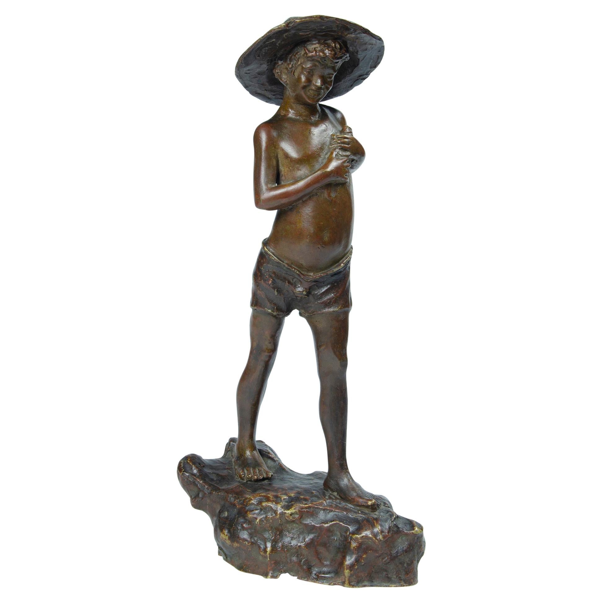 Sculpture en bronze d'un pêcheur motivé