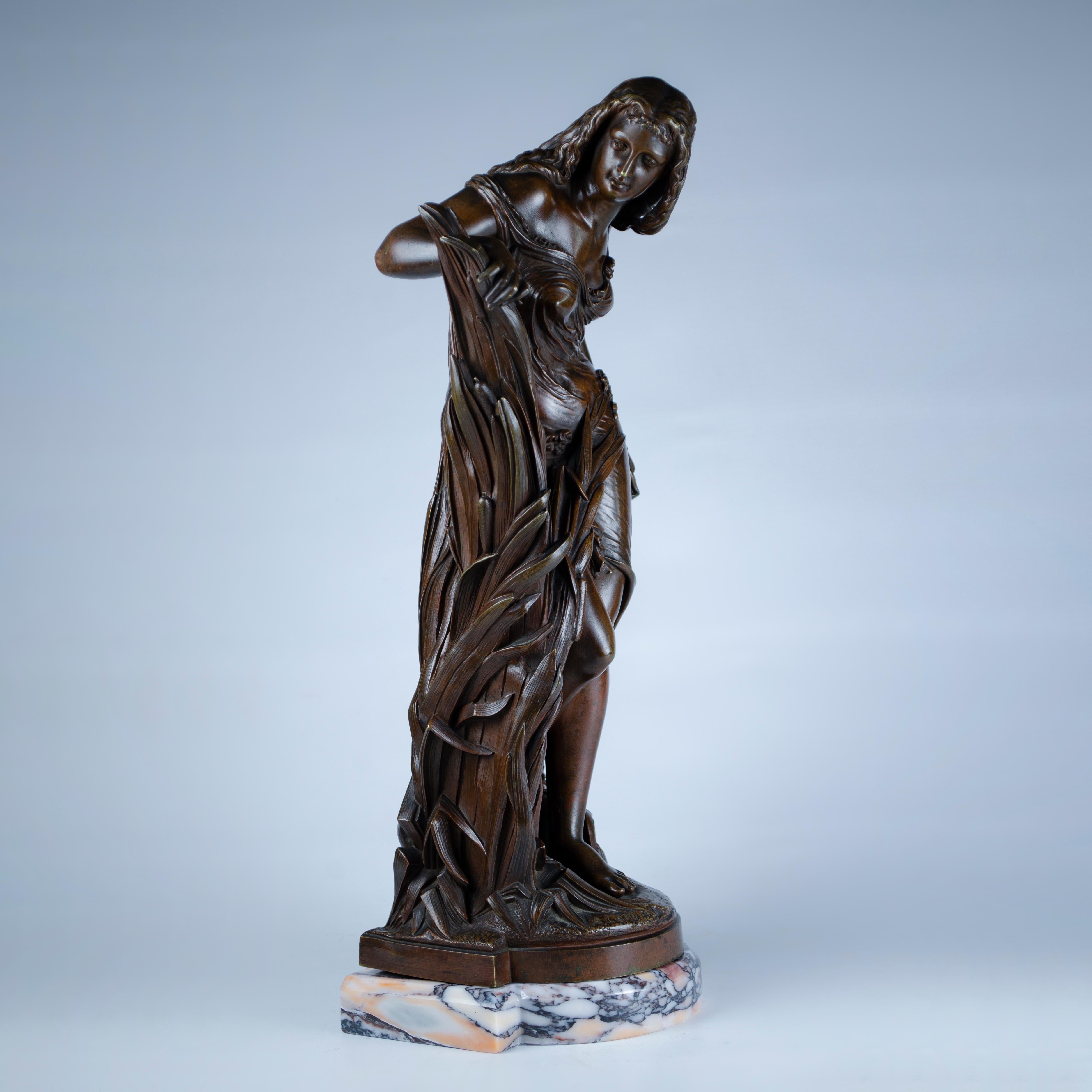 Very finely chiselled cast bronze sculpture depicting a beautiful nude nymph standing emerging from tall reeds at the edge of a stream. At her feet is a water jug, with a marble base. Made by Albert-Ernest Carrier-Belleuse, (1824-1887). Signed A.