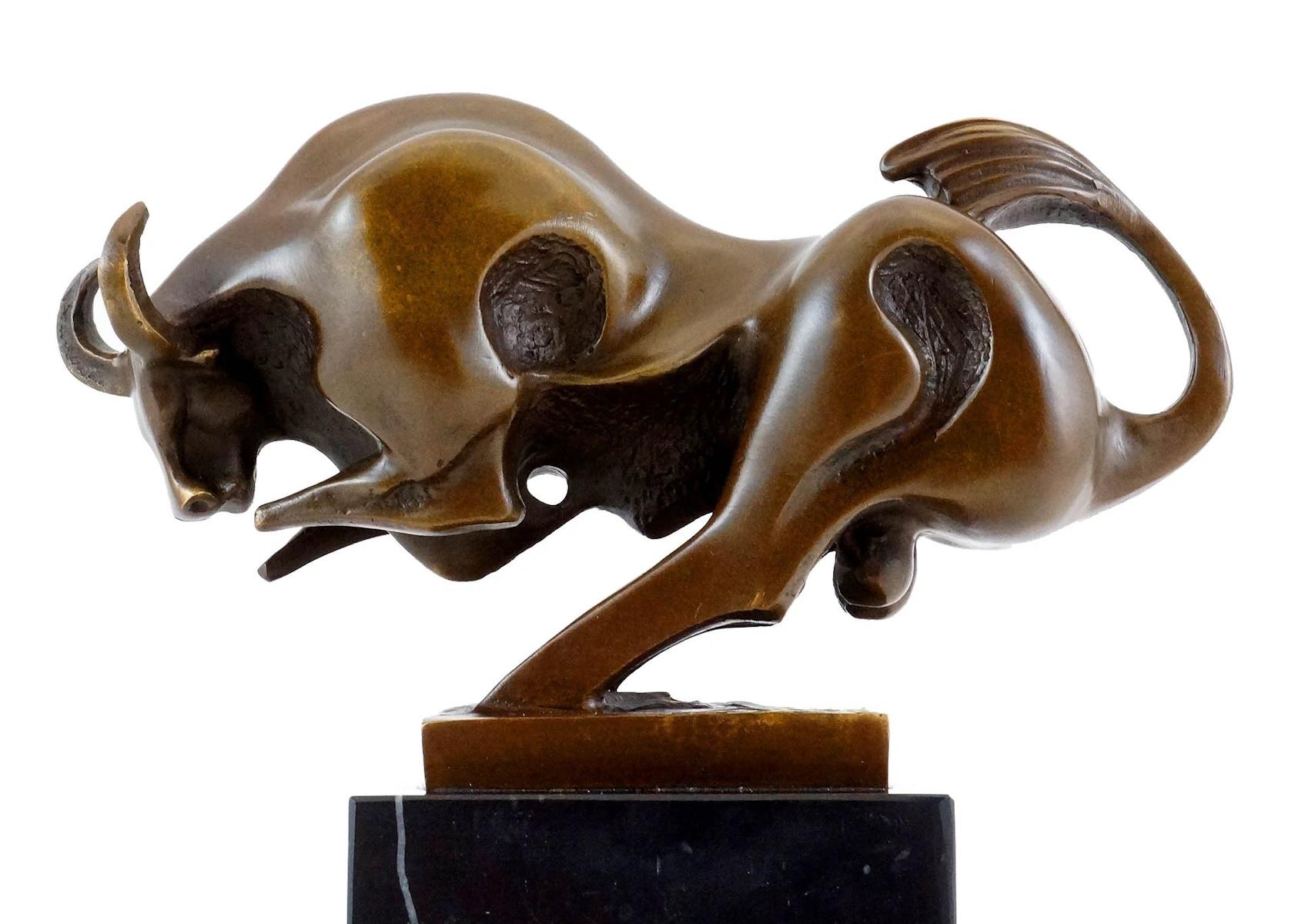 Bronze sculpture of a bull in motion, 20th century.

Bronze sculpture of a running bull, brown patina, 20th century.  

h: 18cm, w: 20.5cm, d: 8cm