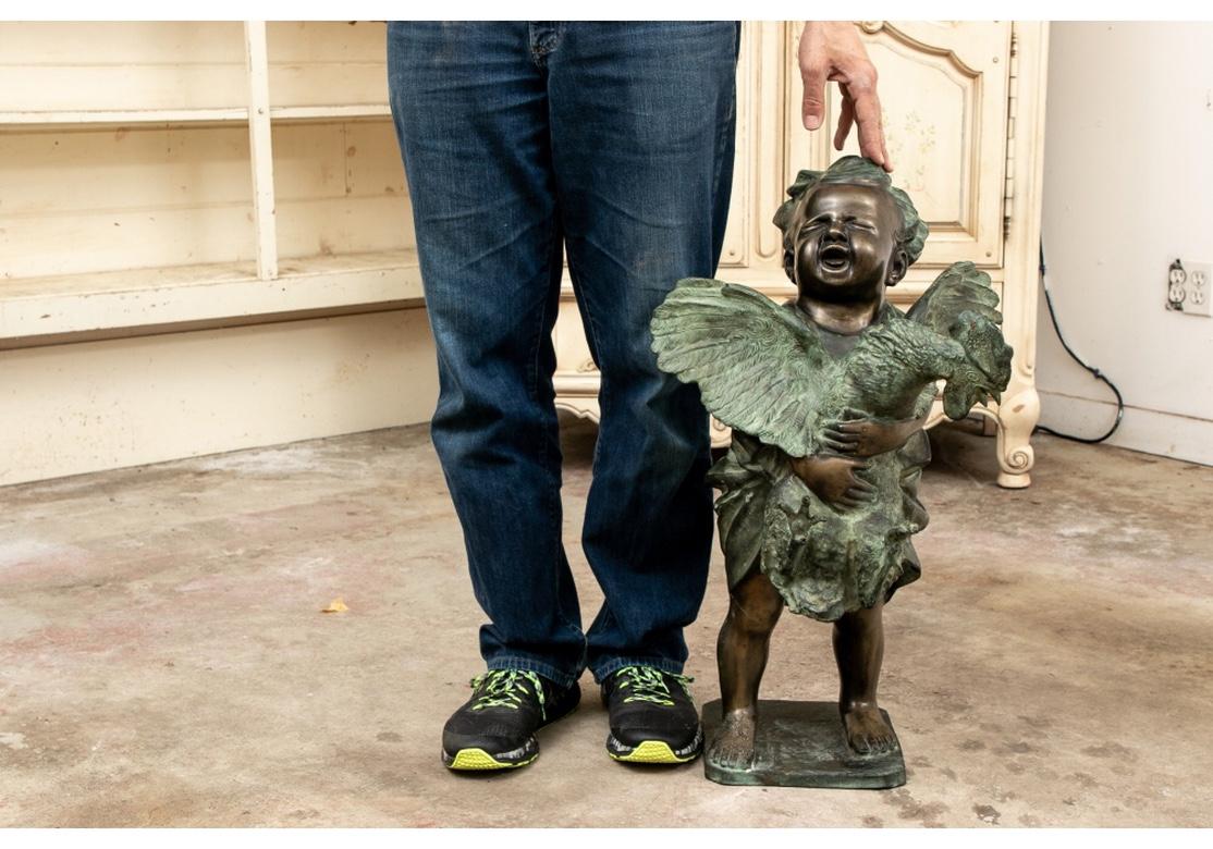 Large and very well detailed bronze of a child bawling while struggling to hold a rooster, standing on a square base. Very well made with great verdigris patina. Suitable for outdoor use. Very good condition.
Measures: 18” wide by 15” deep by 29”