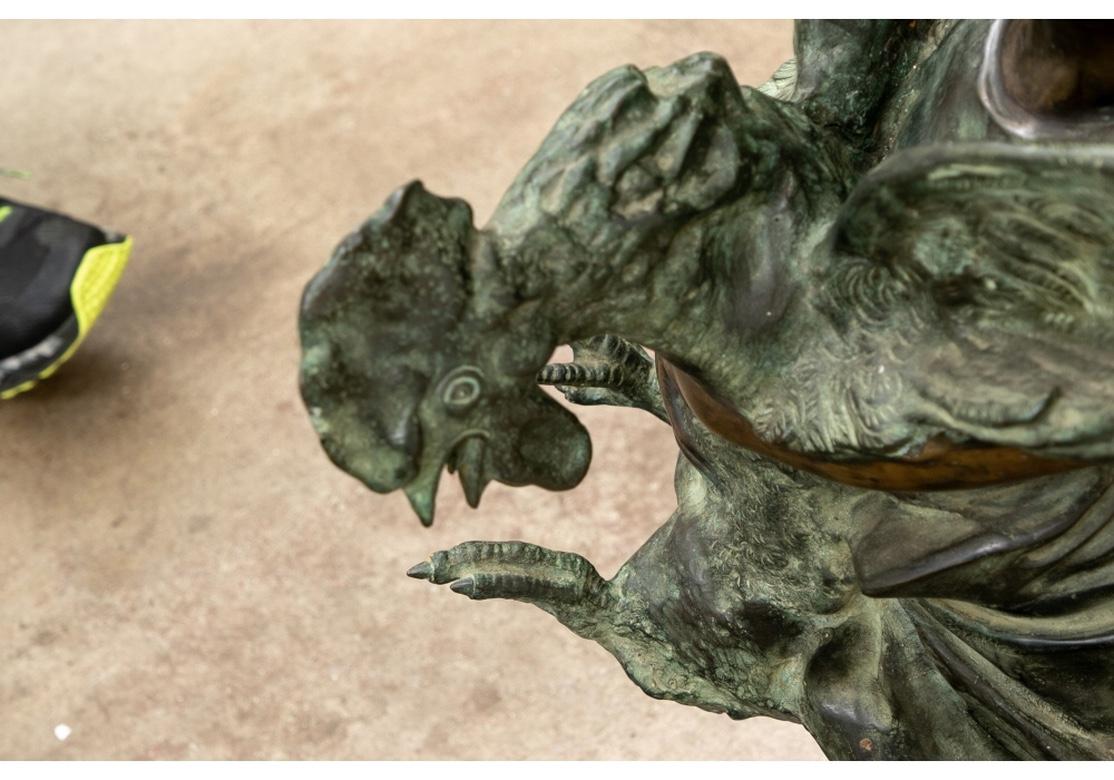 Classique américain Sculpture en bronze d'un enfant tenant un coq turbulent en vente