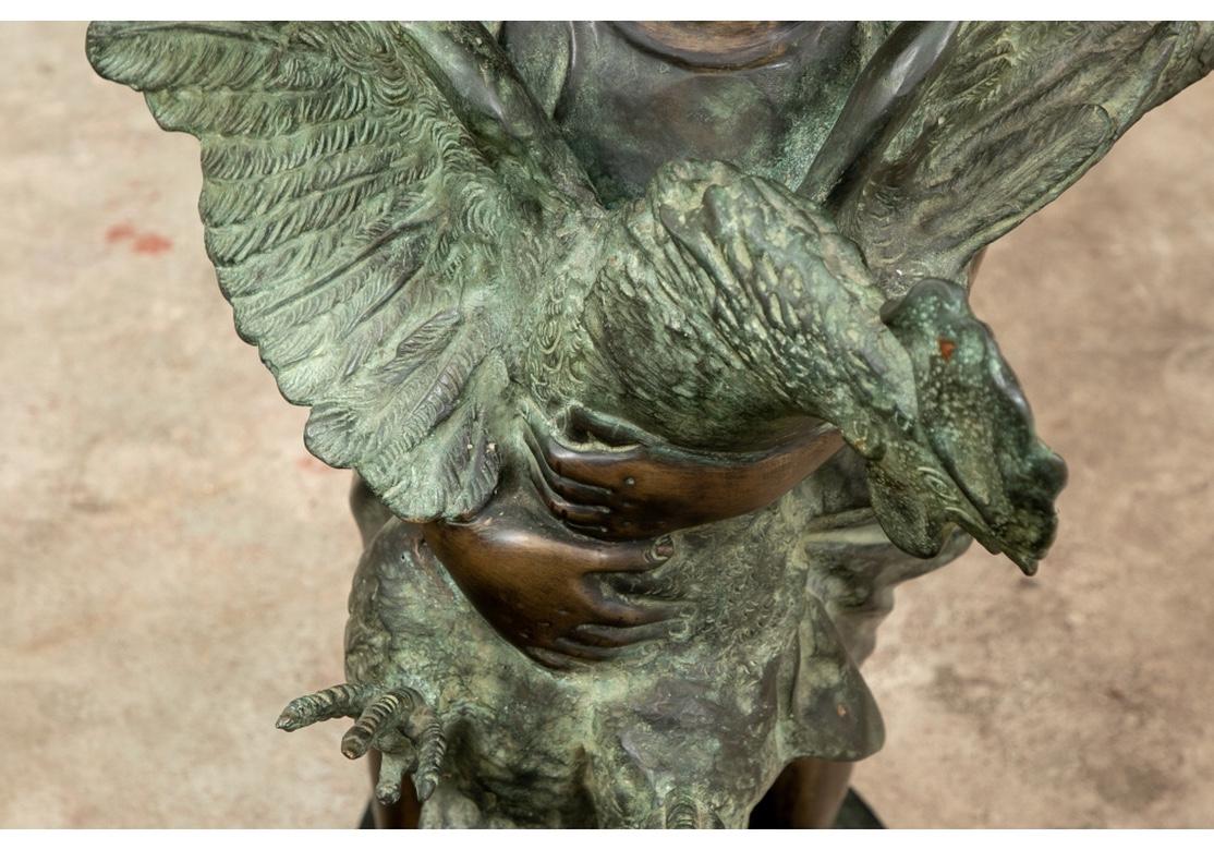 Sculpture en bronze d'un enfant tenant un coq turbulent en vente 2