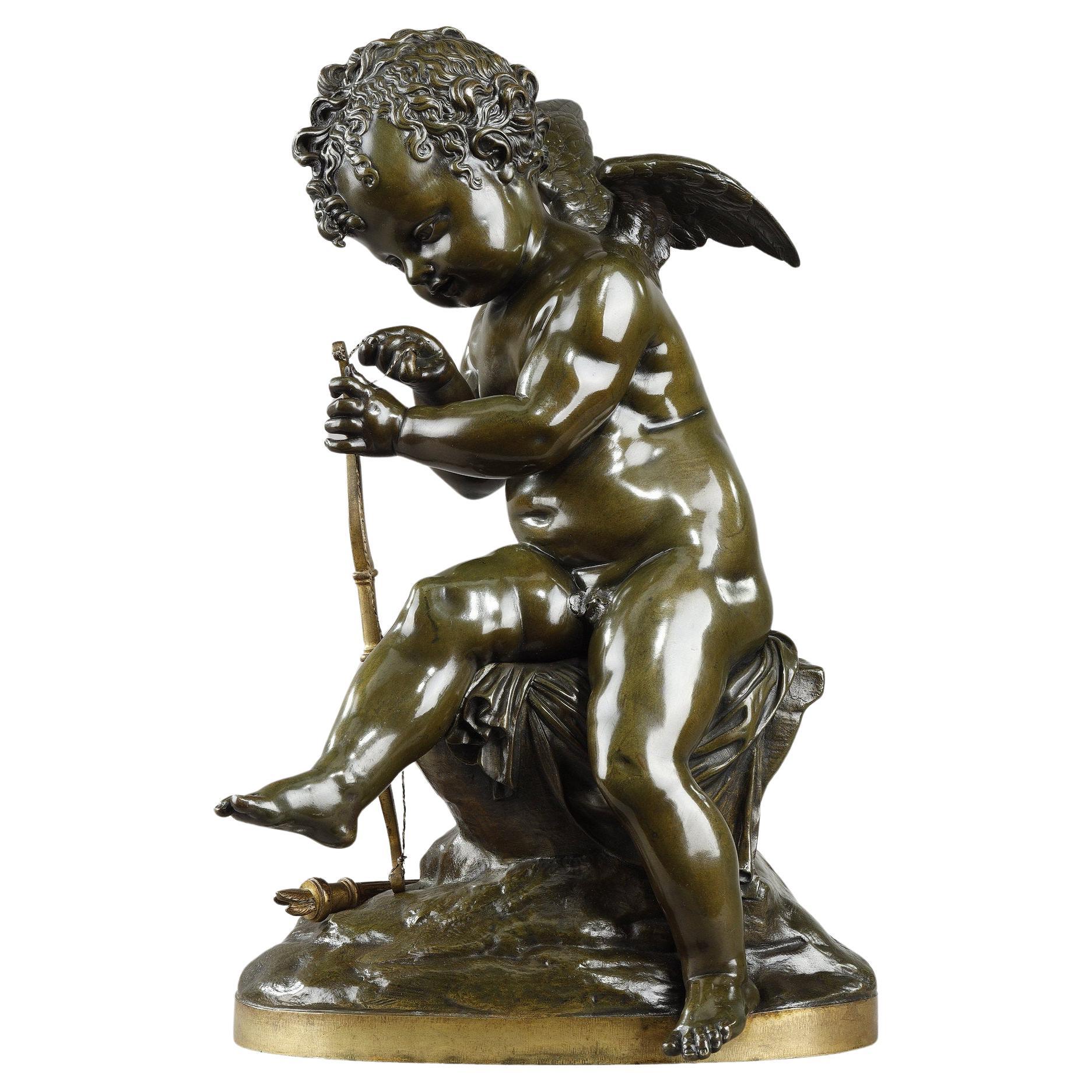 Bronze sculpture of a Cupid, after Lemire For Sale