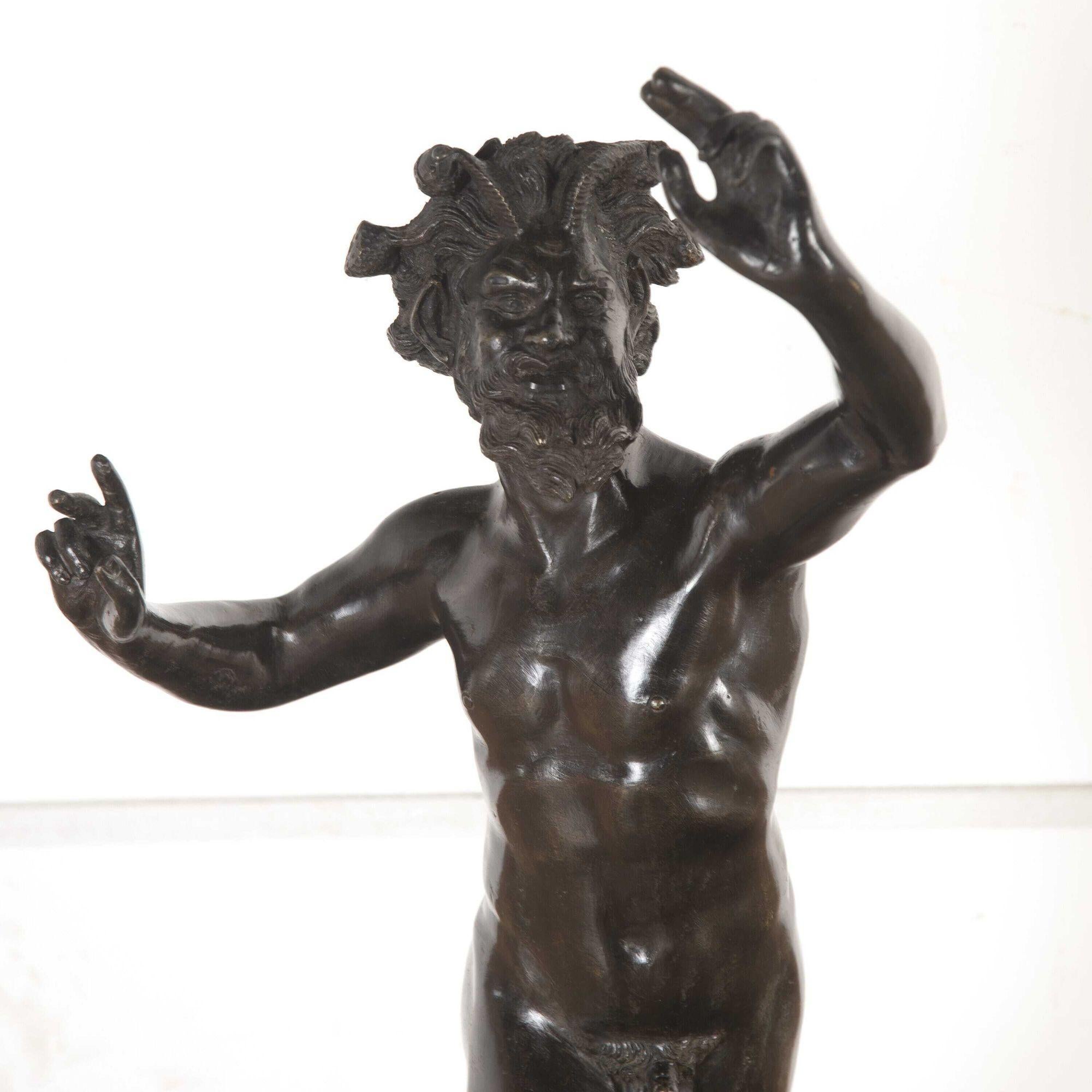 Classic and well-modelled sculpture of a dancing faun.