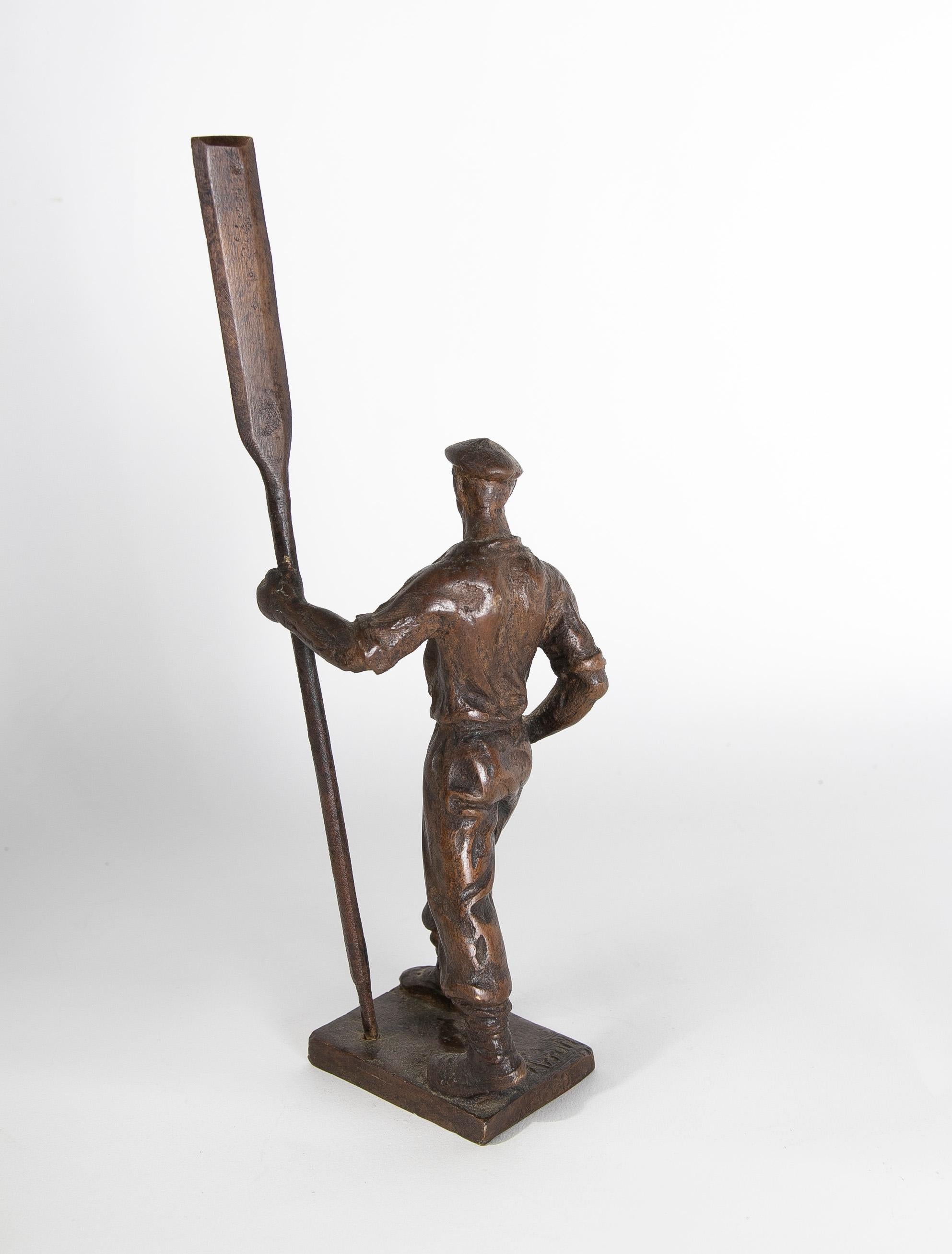 20th Century Bronze Sculpture of a Figure with Oar Signed Arruli For Sale
