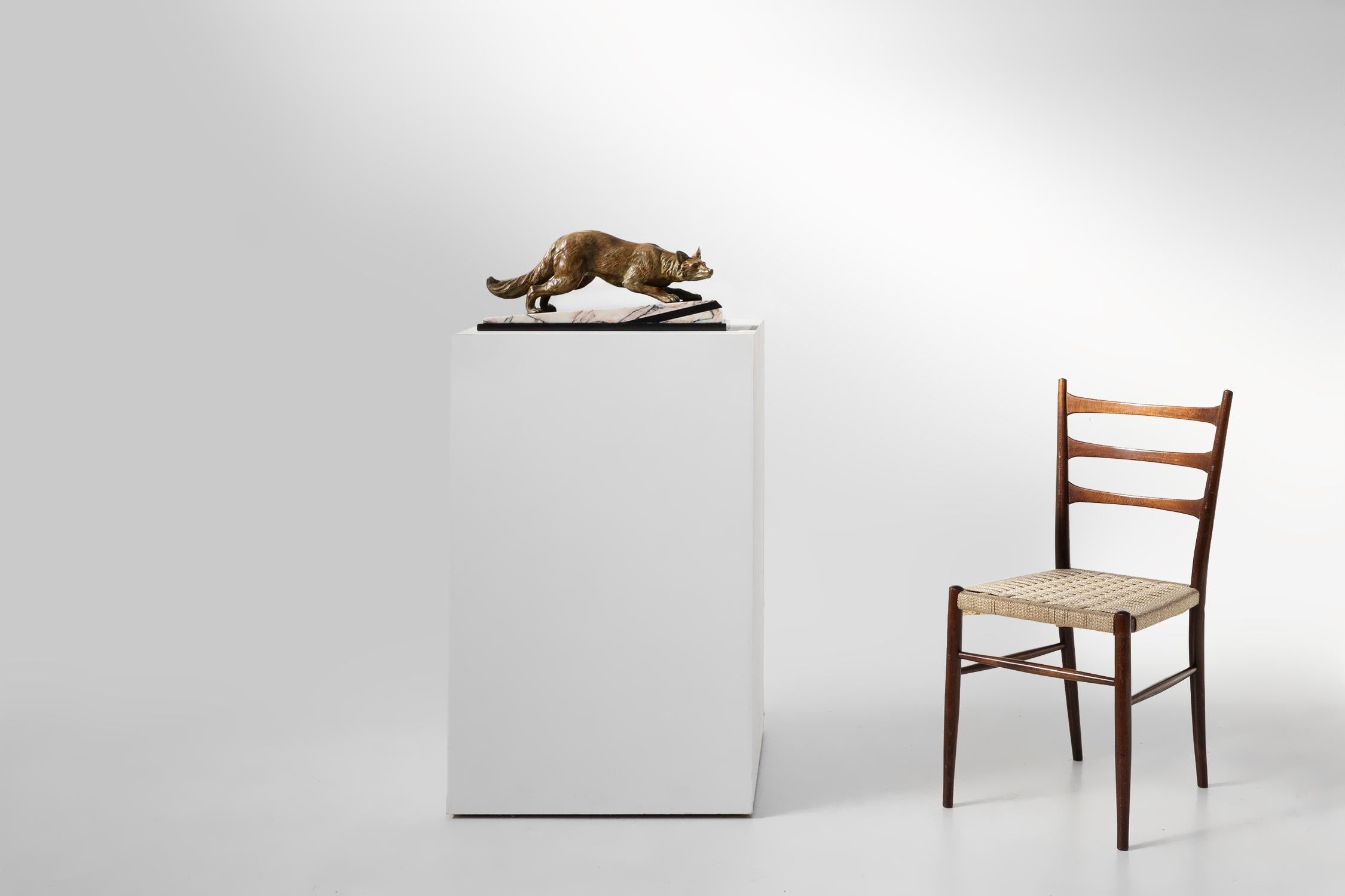 France / 1937 / Bronze / Fox / F.H. Danvin / bronze, marble / art deco

A stunning art deco bronze of a fox resting on a marble statue by the French artist F.H. Danvin. The bronze is signed at the bottom of the marble.

The statue showcases the fox