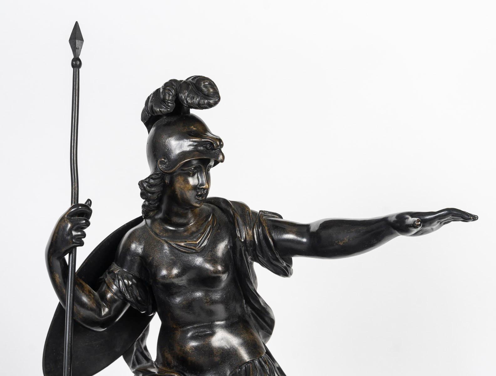 Scultura in bronzo di una donna elmata circondata da putti, periodo di Napoleone III, XIX secolo.

Scultura in bronzo con patina marrone che poggia su una base di marmo, risalente al periodo di Napoleone III, XIX secolo, raffigurante una donna