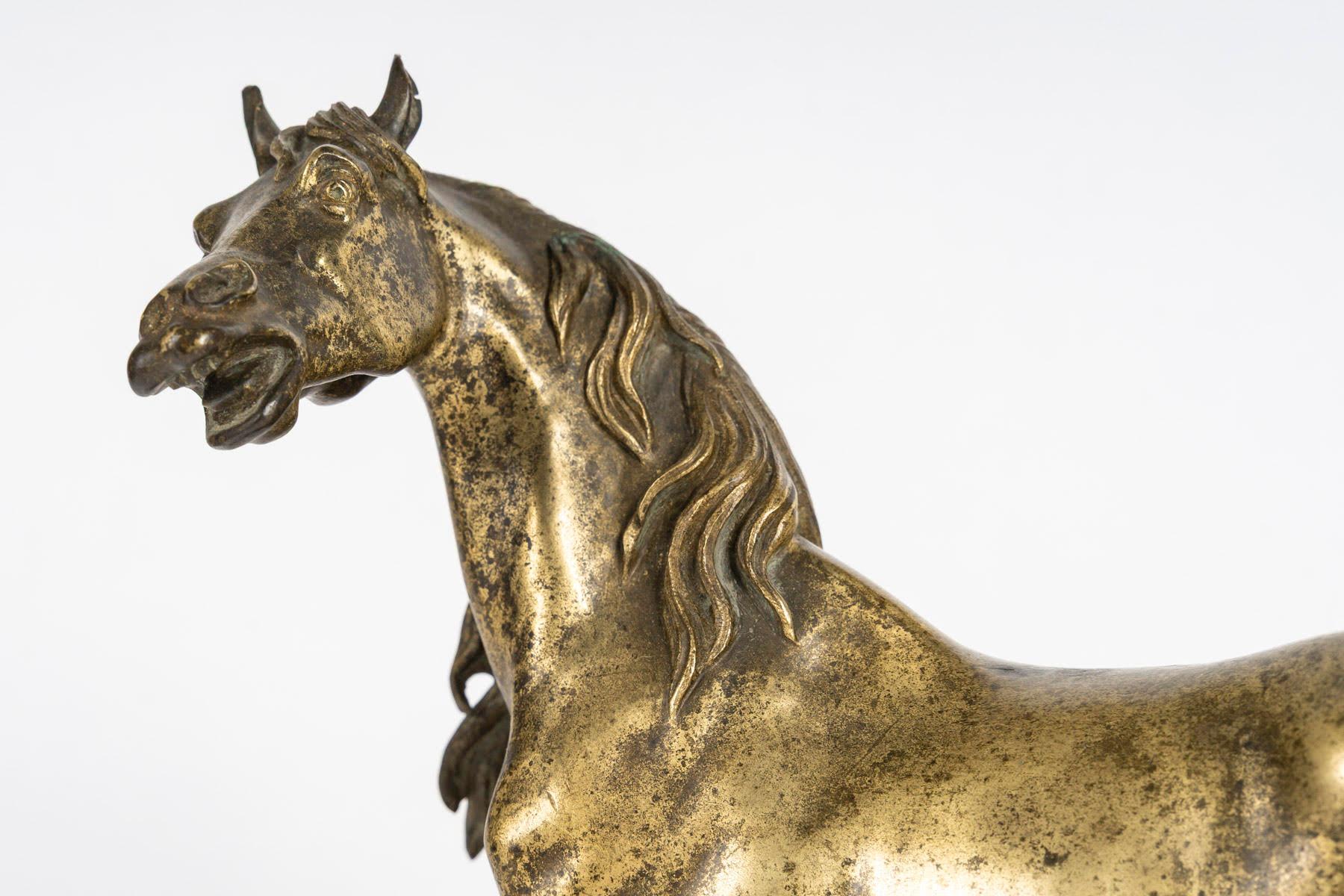 Bronze sculpture of a horse, 20th century.

Early 20th century bronze sculpture of a horse.
H: 21cm, W: 22cm, D: 9cm