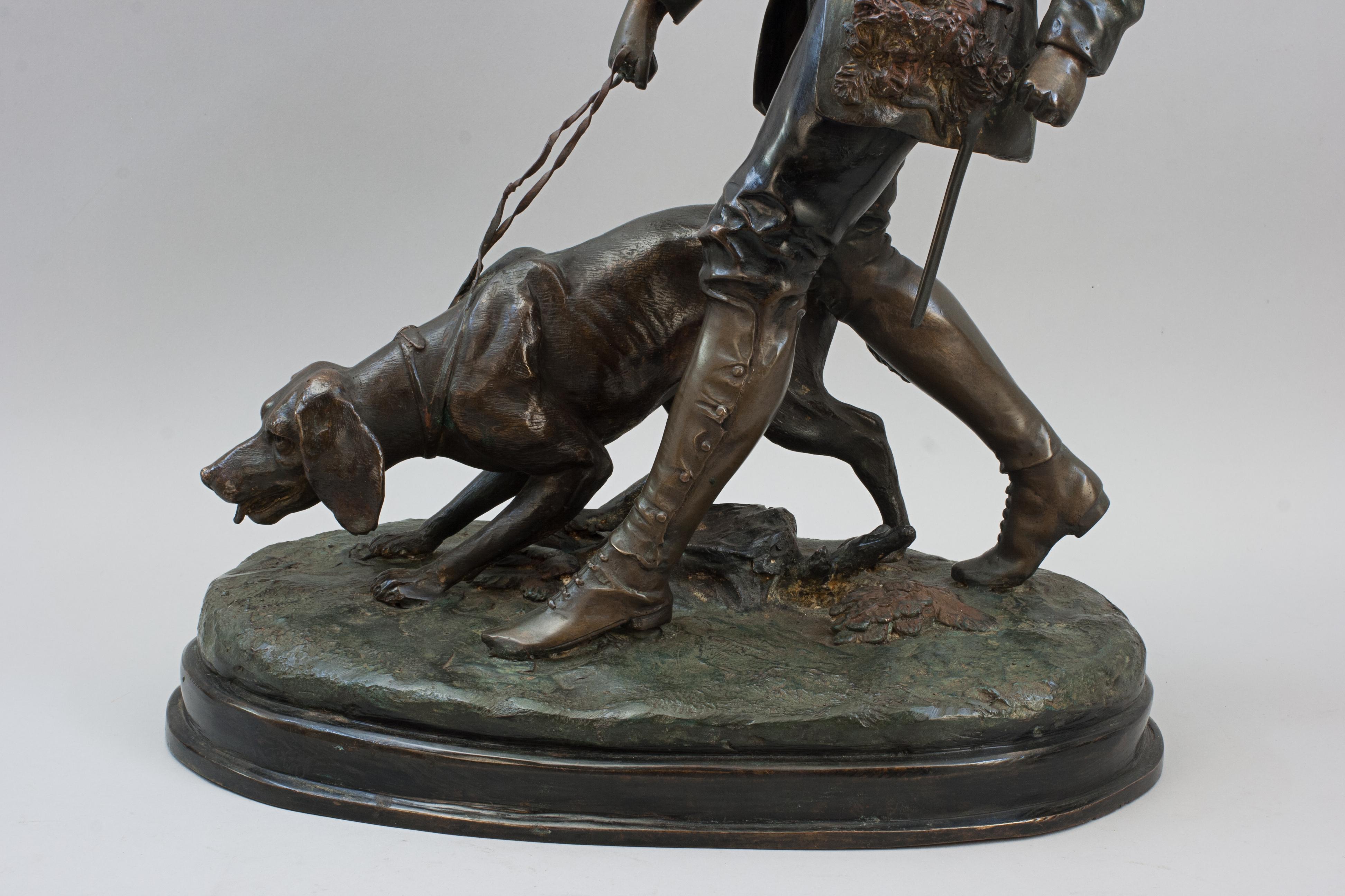 XX secolo Scultura in bronzo di cacciatore con cane da caccia in vendita