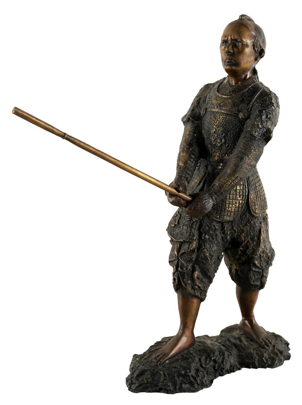 Late 20th Century Bronze sculpture of a Japanese Samurai warrior depicted holding a removable staff. Lost wax casting. Patinated bronze.