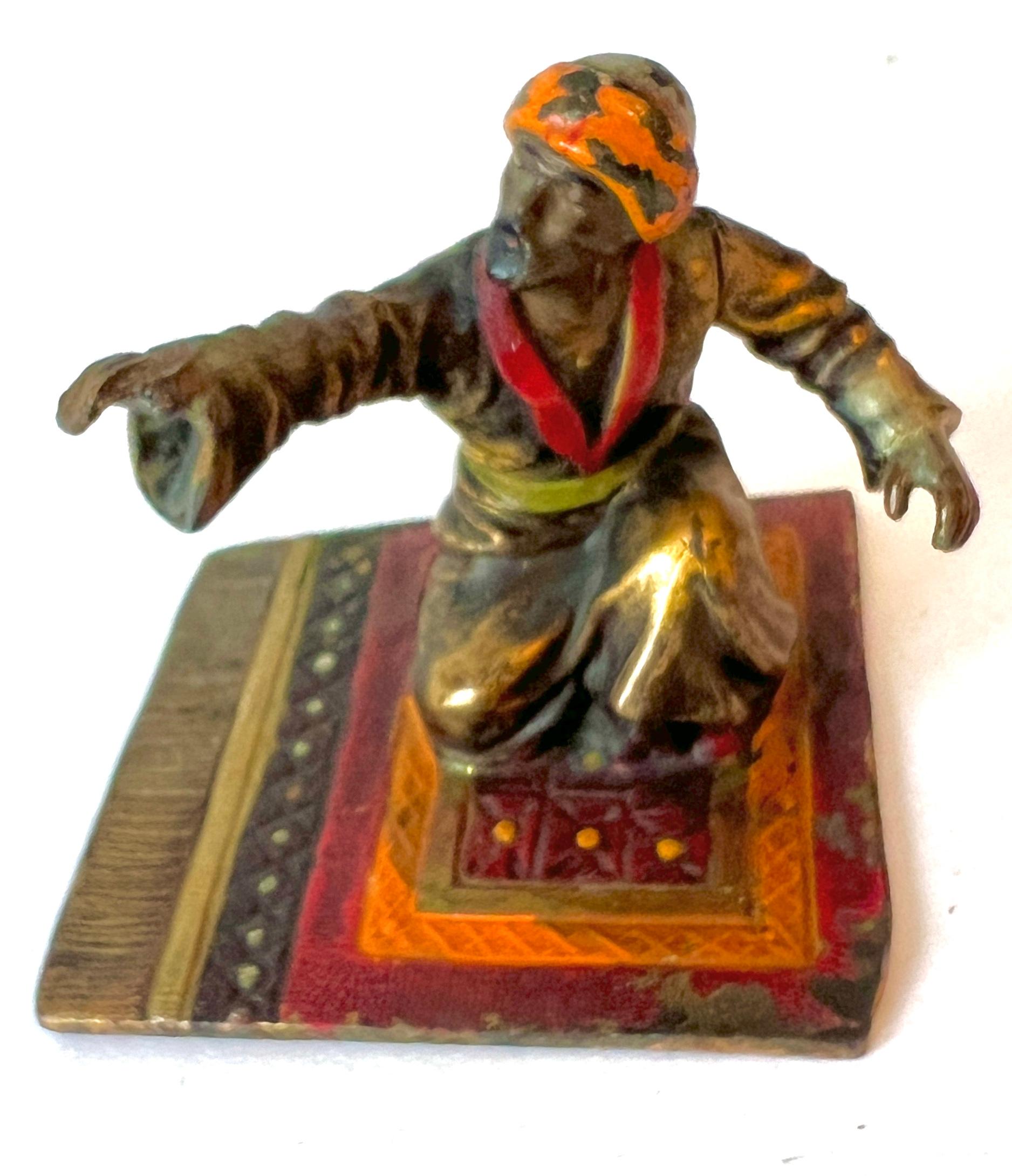 Escultura de bronce de un hombre de Oriente Medio sobre una alfombra al estilo de Franz Bergmann en Bueno estado para la venta en Los Angeles, CA