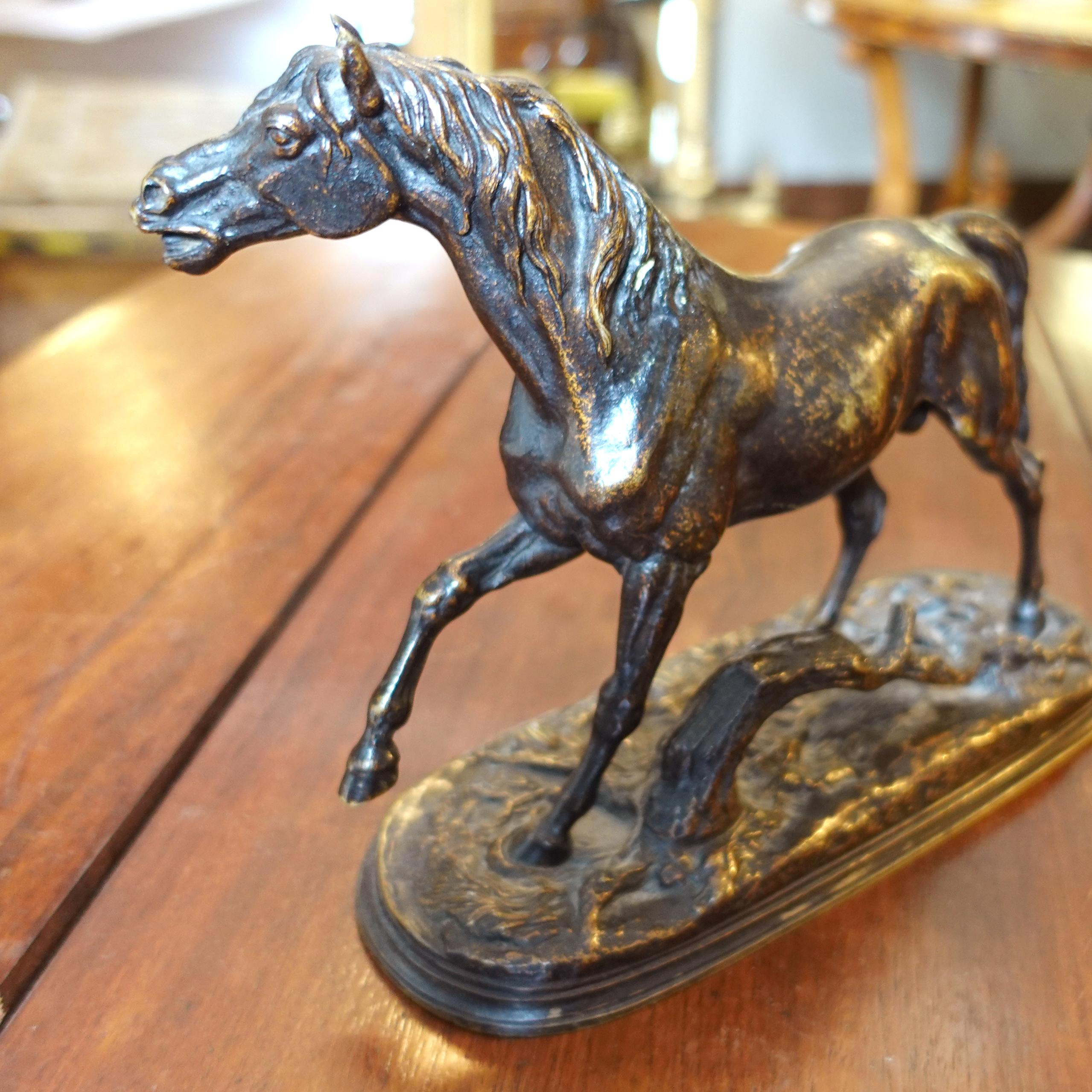 Bronze sculpture of a Persian Stallion by Jules Moigniez

Probably cast by Auguste Gouge, after a model by Jules Moigniez
France; ca. 1900
Bronze

Approximate size: 7.75”H x 9.5”W x 3.25”D

Jules Moigniez's superb bronze sculpture of a Persian