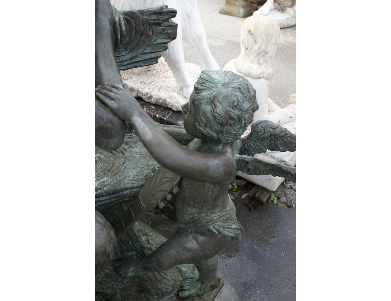 Bronze Sculpture of a Woman Seated on a Bench with Winged Angels 2