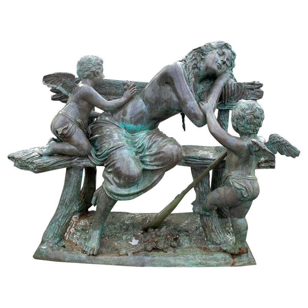 Bronze Sculpture of a Woman Seated on a Bench with Winged Angels