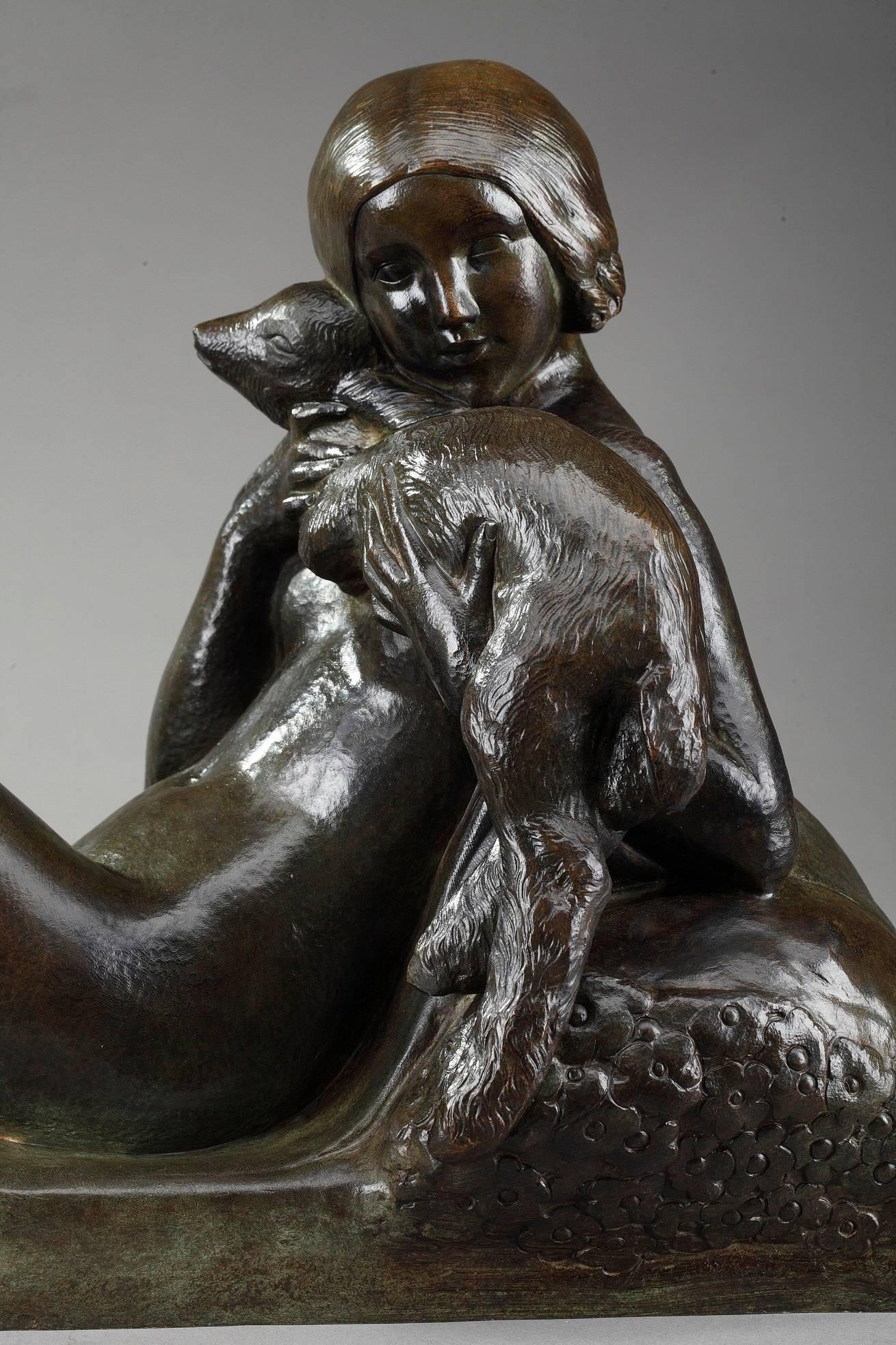Small bronze sculpture by French sculptor George Coste featuring a naked young woman with her lamb. Beautiful brown-green patina. Signed on the base: Georges Coste. The elegance of the woman presented on this sculpture is an illustration of the most